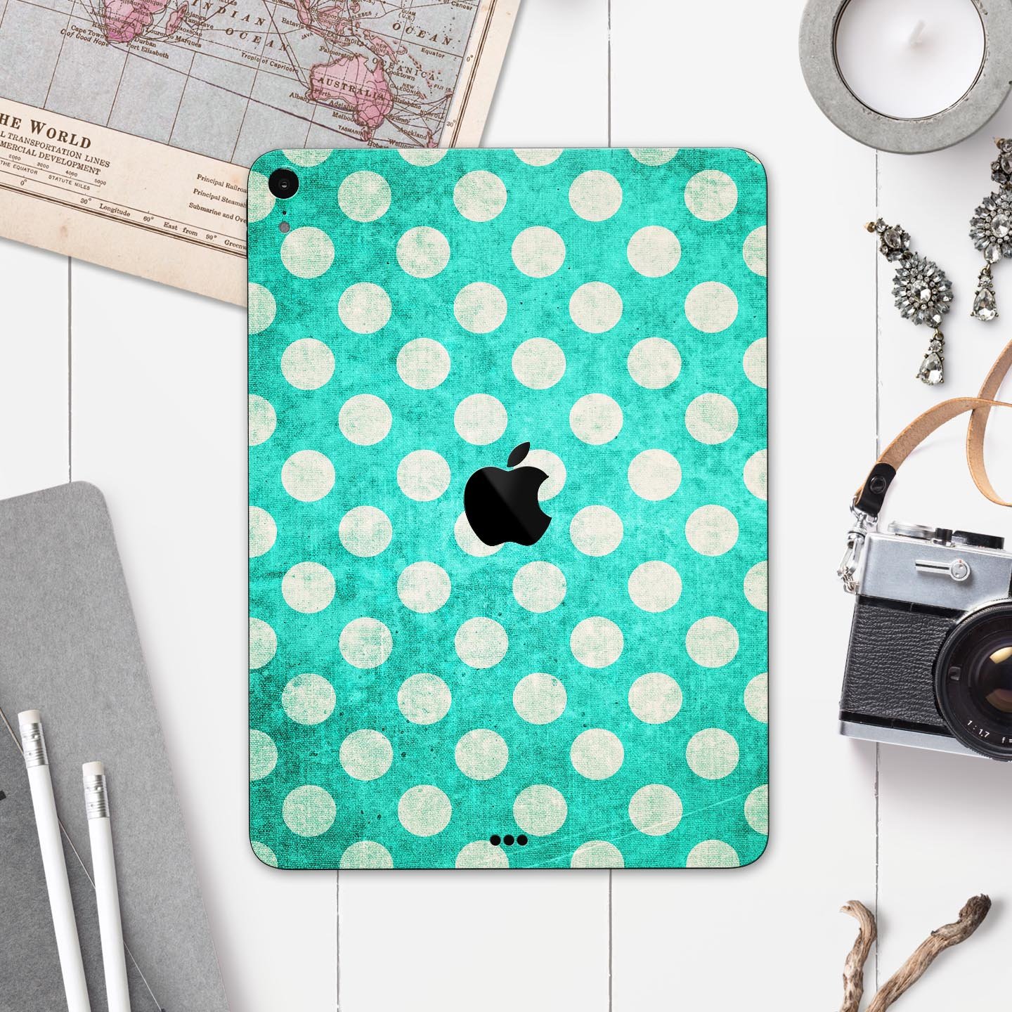 Grungy teal and white polka dots full body skin decal for Apple devices, showcasing a stylish design with premium finish.