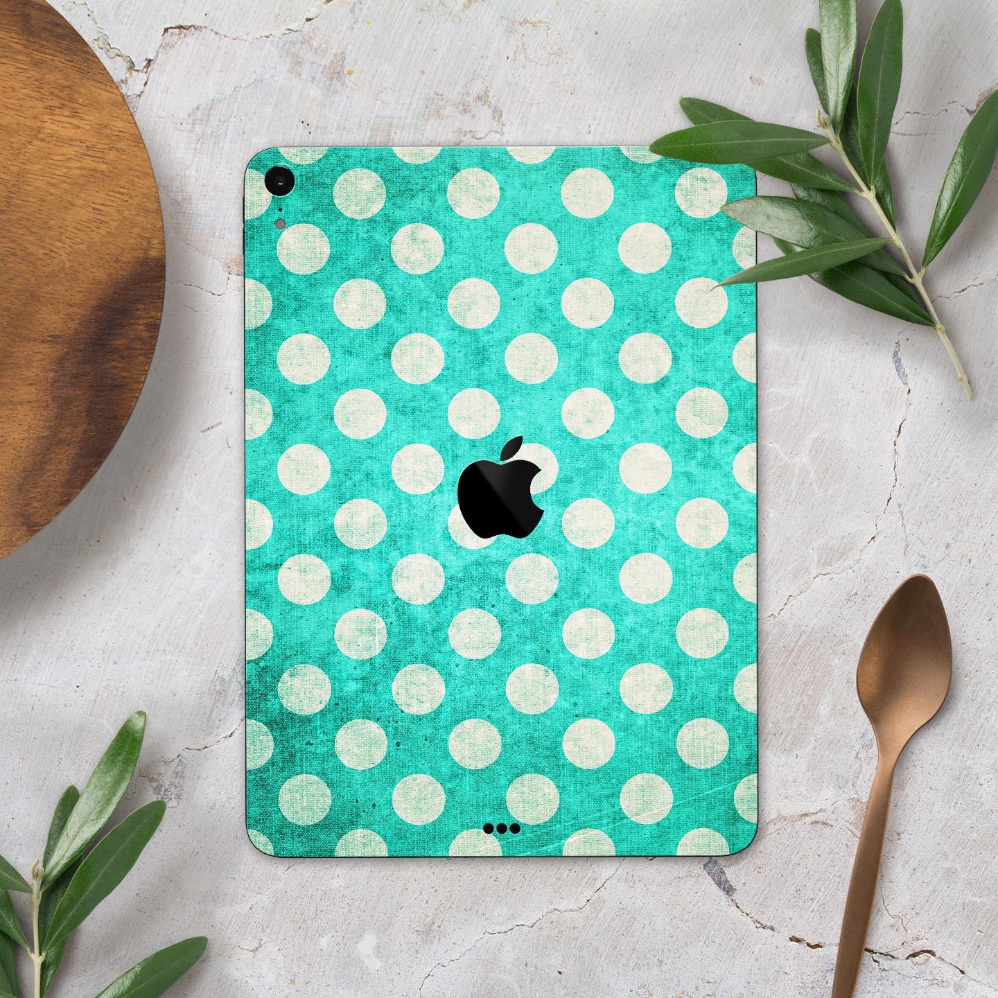 Grungy teal and white polka dots full body skin decal for Apple devices, showcasing a stylish design with premium finish.