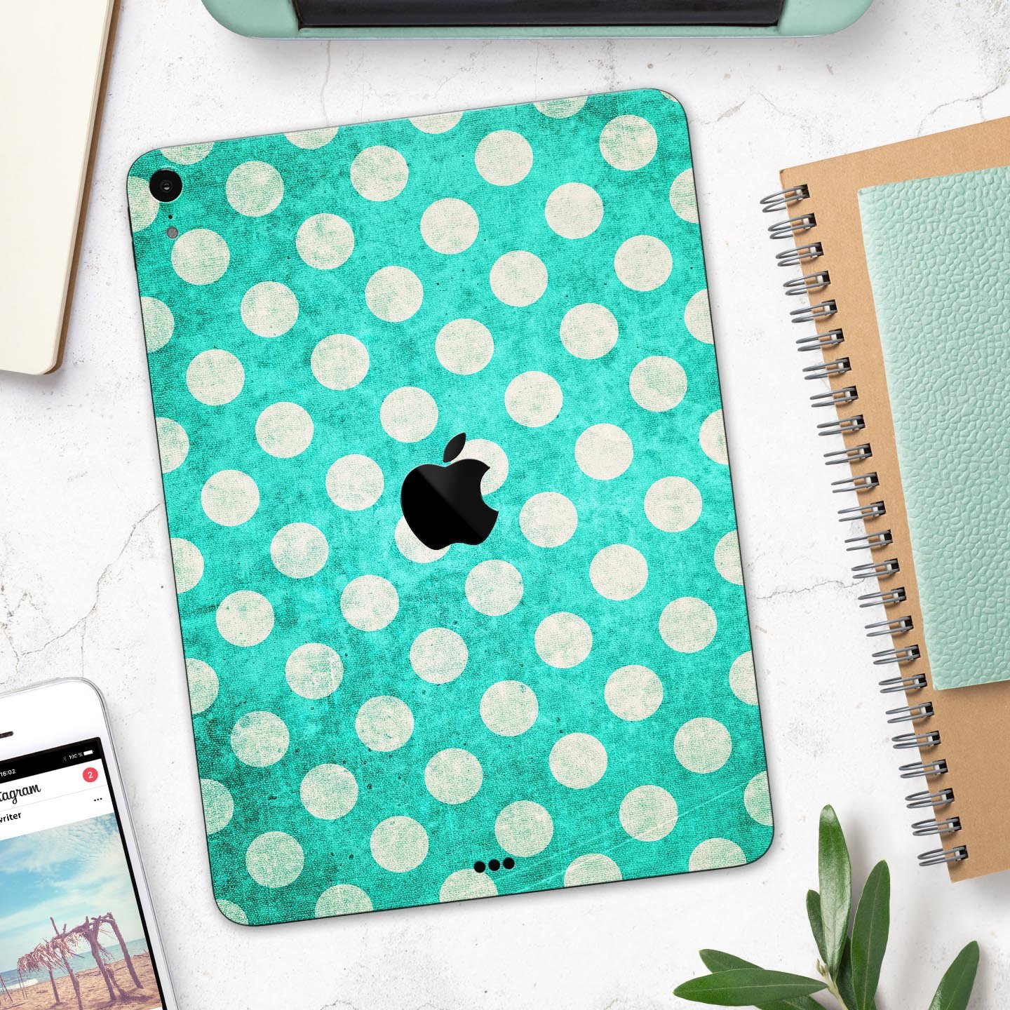 Grungy teal and white polka dots full body skin decal for Apple devices, showcasing a stylish design with premium finish.