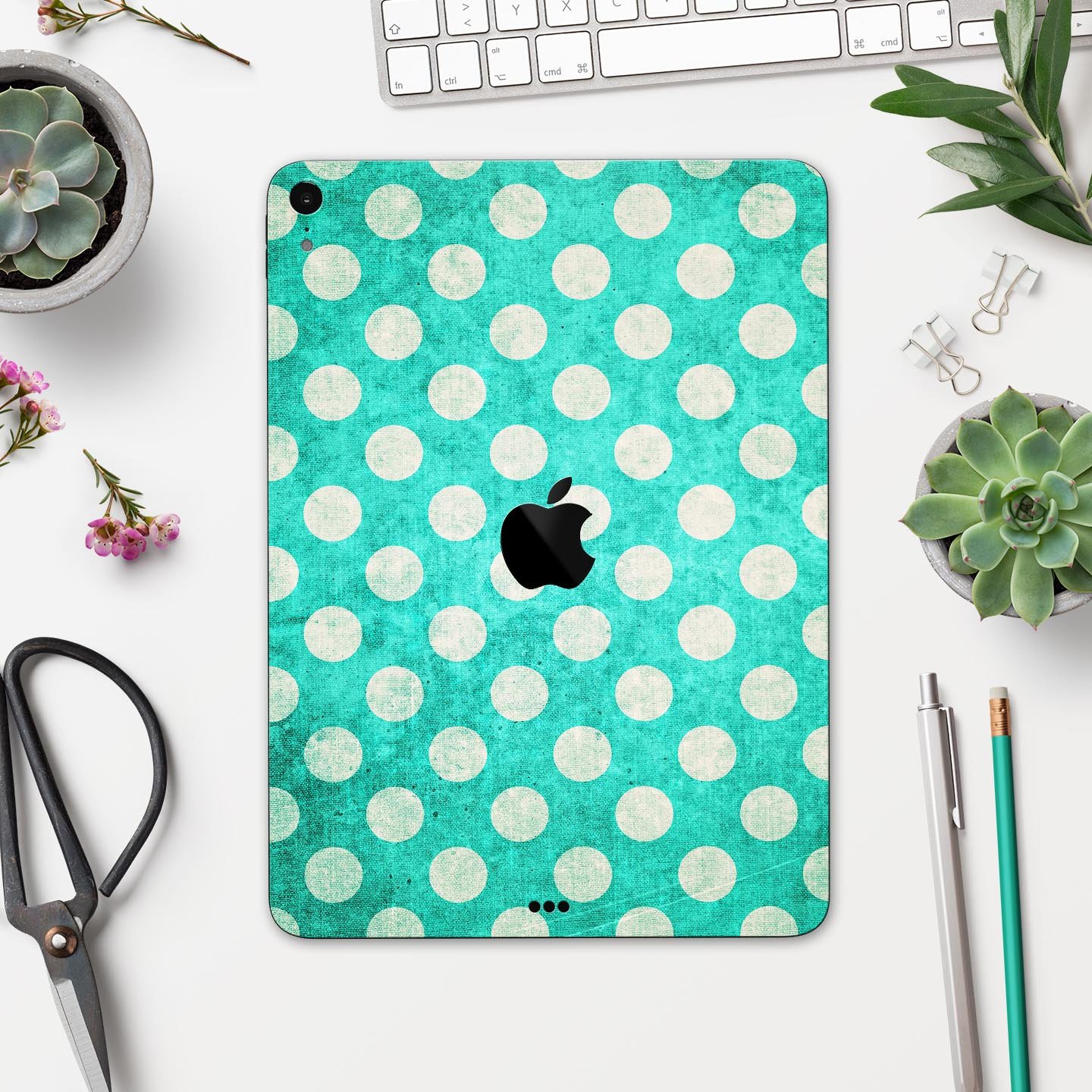 Grungy teal and white polka dots full body skin decal for Apple devices, showcasing a stylish design with premium finish.