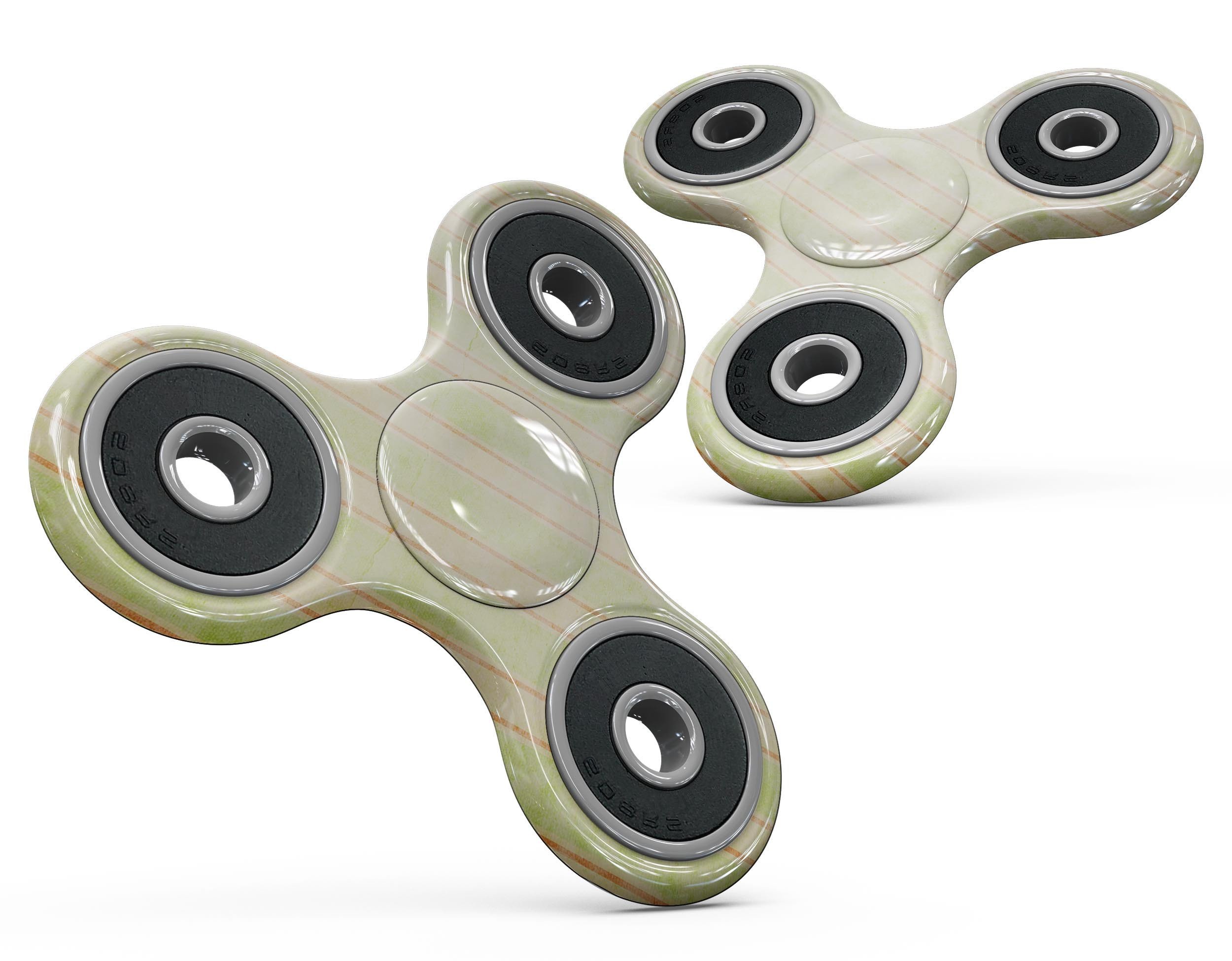 Grungy yellow faded vertical stripes skin kit for fidget spinner, showcasing vibrant design and premium vinyl material.