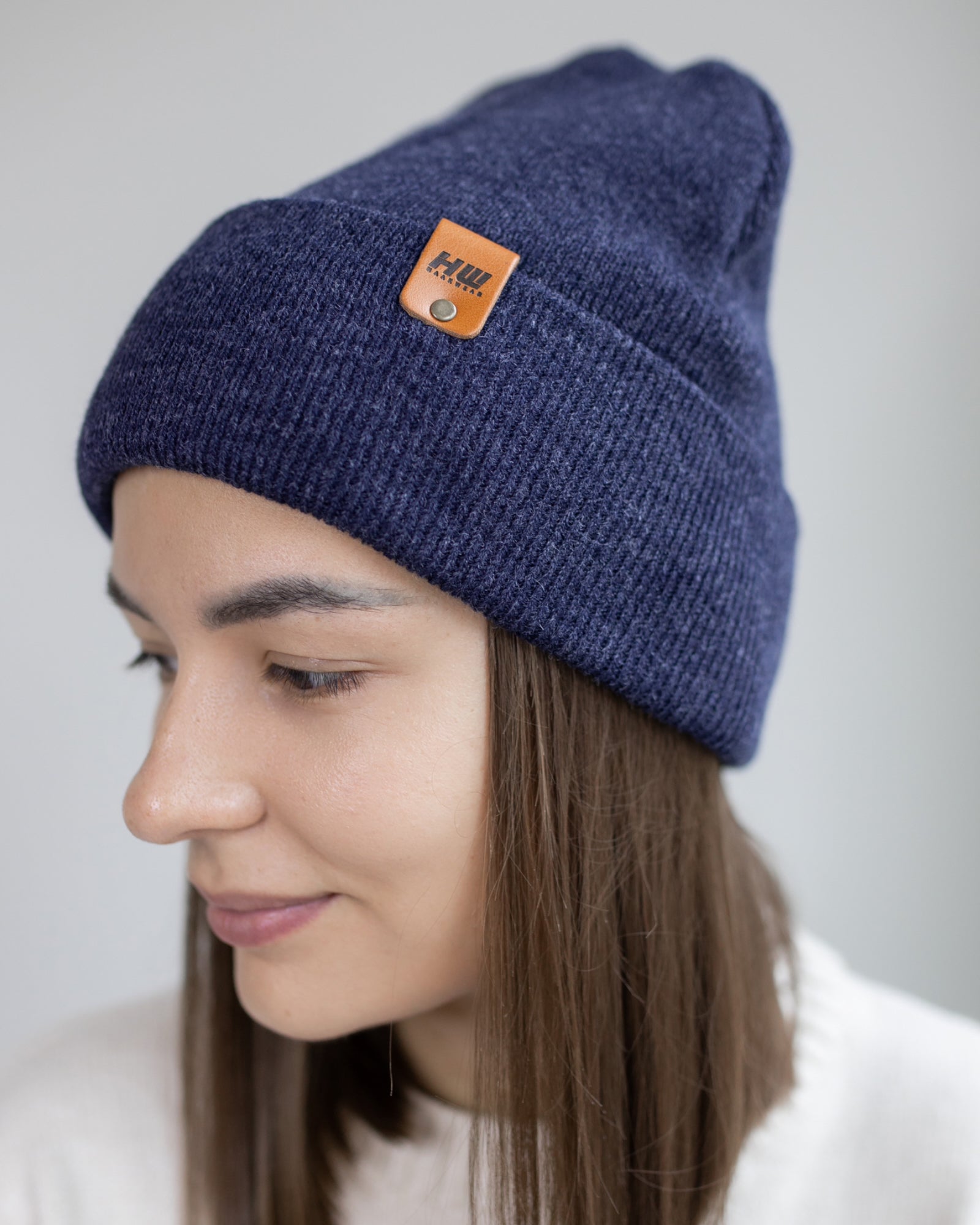 HAAKWEAR Knit Cuffed Beanie in Denim Blue, showcasing its stylish design and quality craftsmanship.