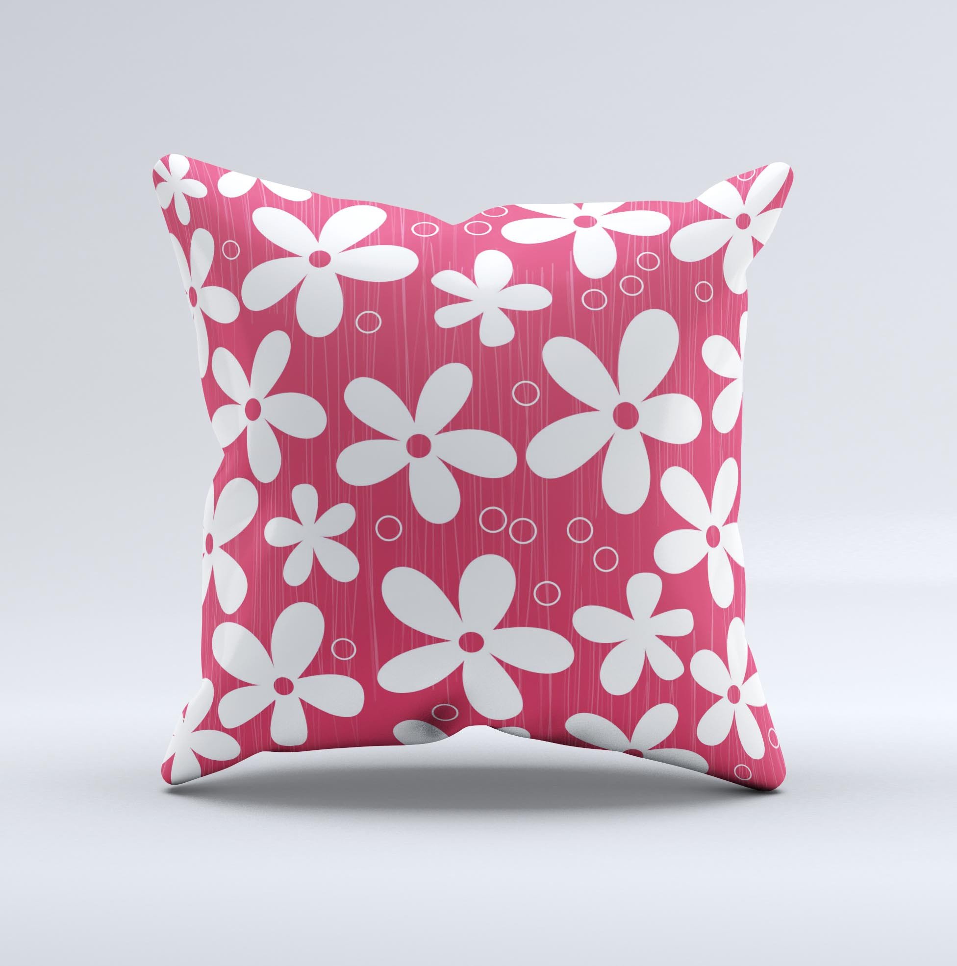 A decorative throw pillow featuring a hanging white vector floral design on a vibrant red background, showcasing its handcrafted quality.