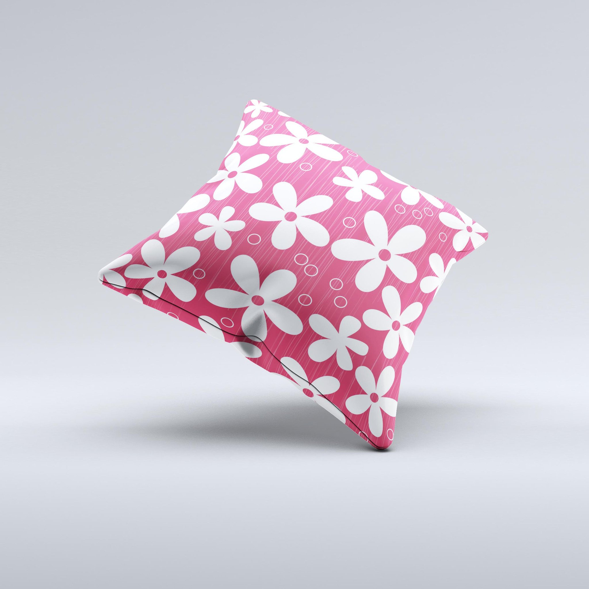 A decorative throw pillow featuring a hanging white vector floral design on a vibrant red background, showcasing its handcrafted quality.