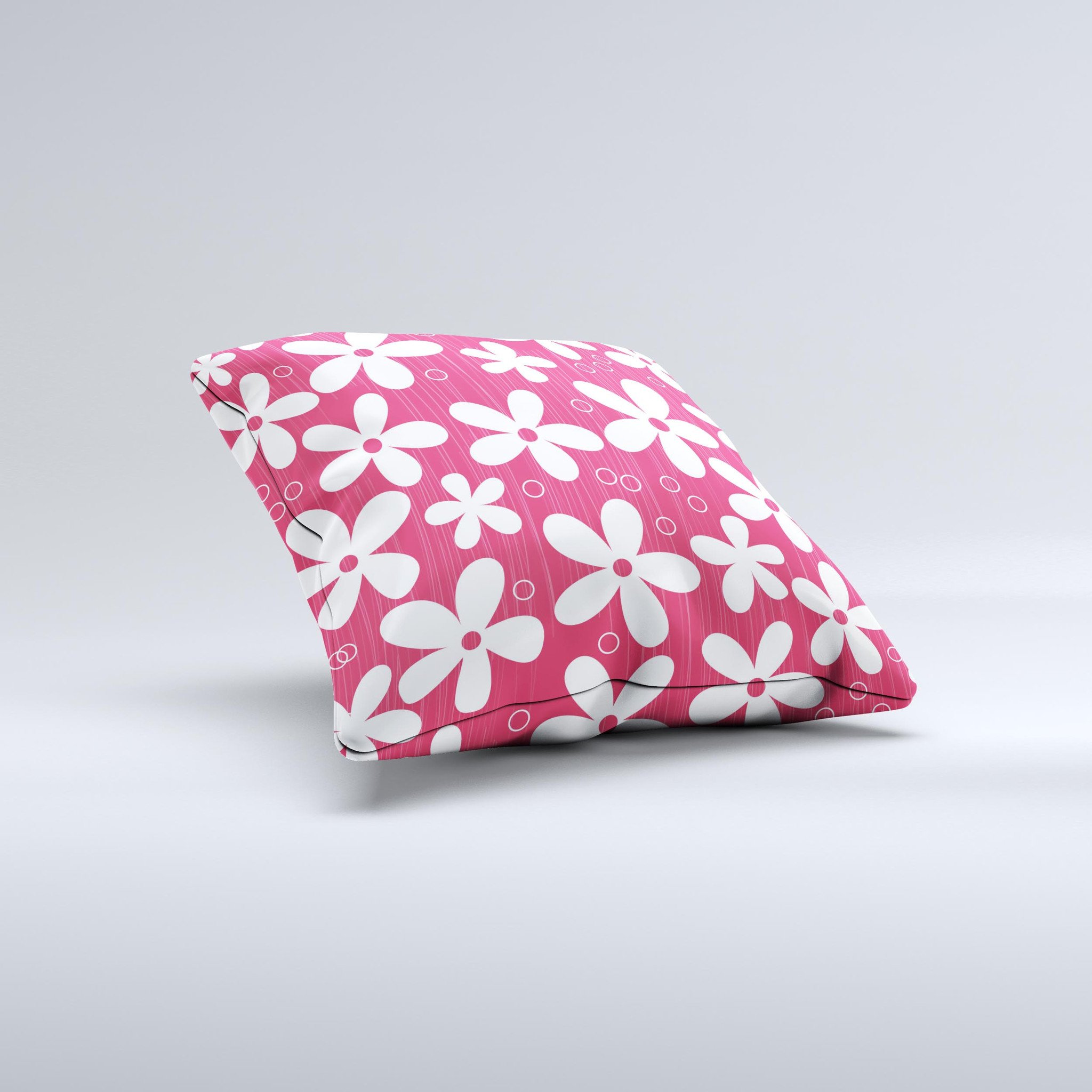 A decorative throw pillow featuring a hanging white vector floral design on a vibrant red background, showcasing its handcrafted quality.