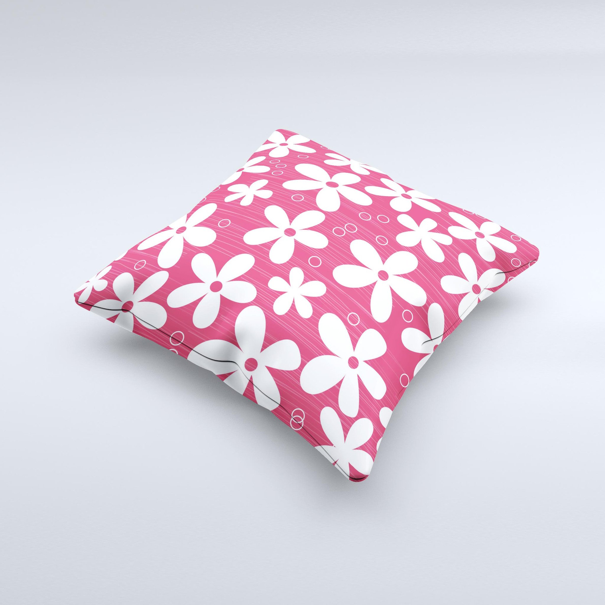 A decorative throw pillow featuring a hanging white vector floral design on a vibrant red background, showcasing its handcrafted quality.