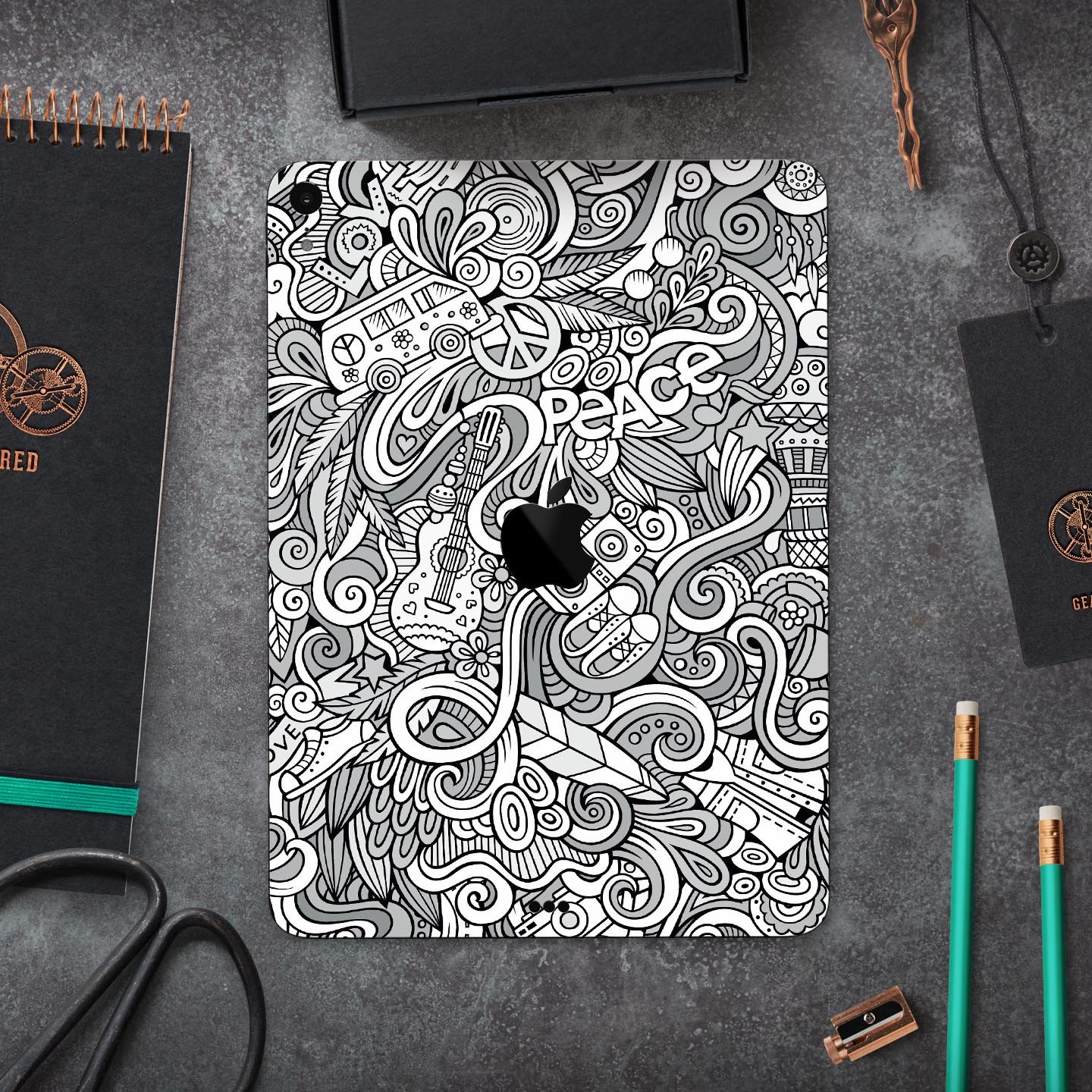 Hippie Dippie Doodles Full Body Skin Decal for Apple iPad Pro, showcasing vibrant colors and intricate designs on a sleek device.