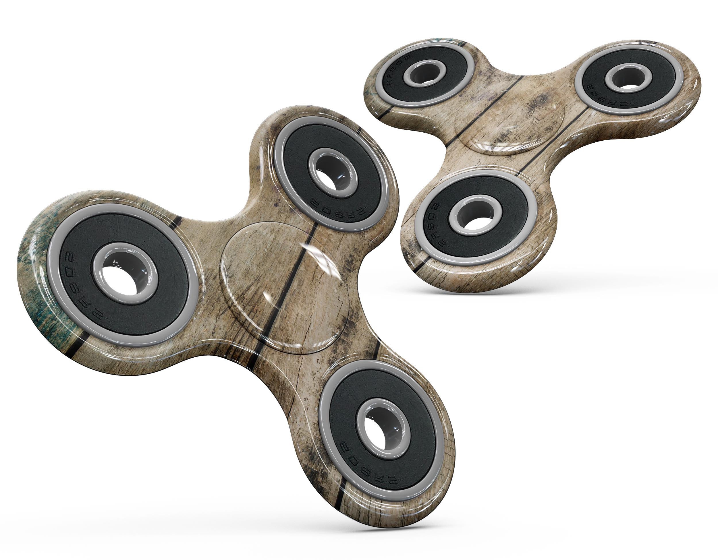 Horizontal planks design fidget spinner skin kit in chipped blue color, showcasing its vibrant pattern and premium vinyl material.