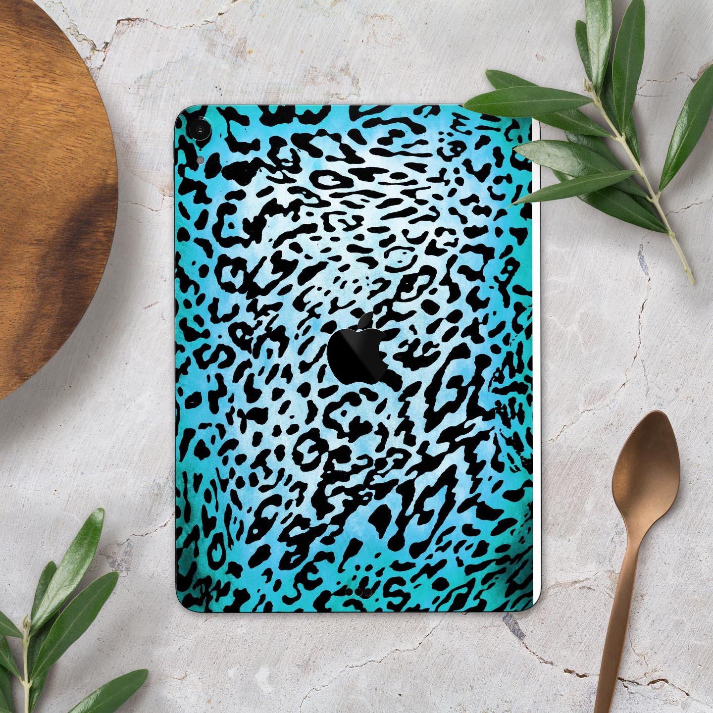 Hot teal cheetah animal print full body skin decal for Apple devices, showcasing vibrant colors and sleek design.