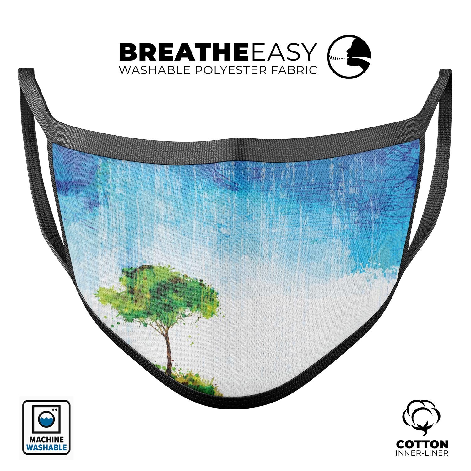 Individual Tree Splatter mouth cover, featuring a unique design, adjustable ear loops, and made from soft cotton for comfort.