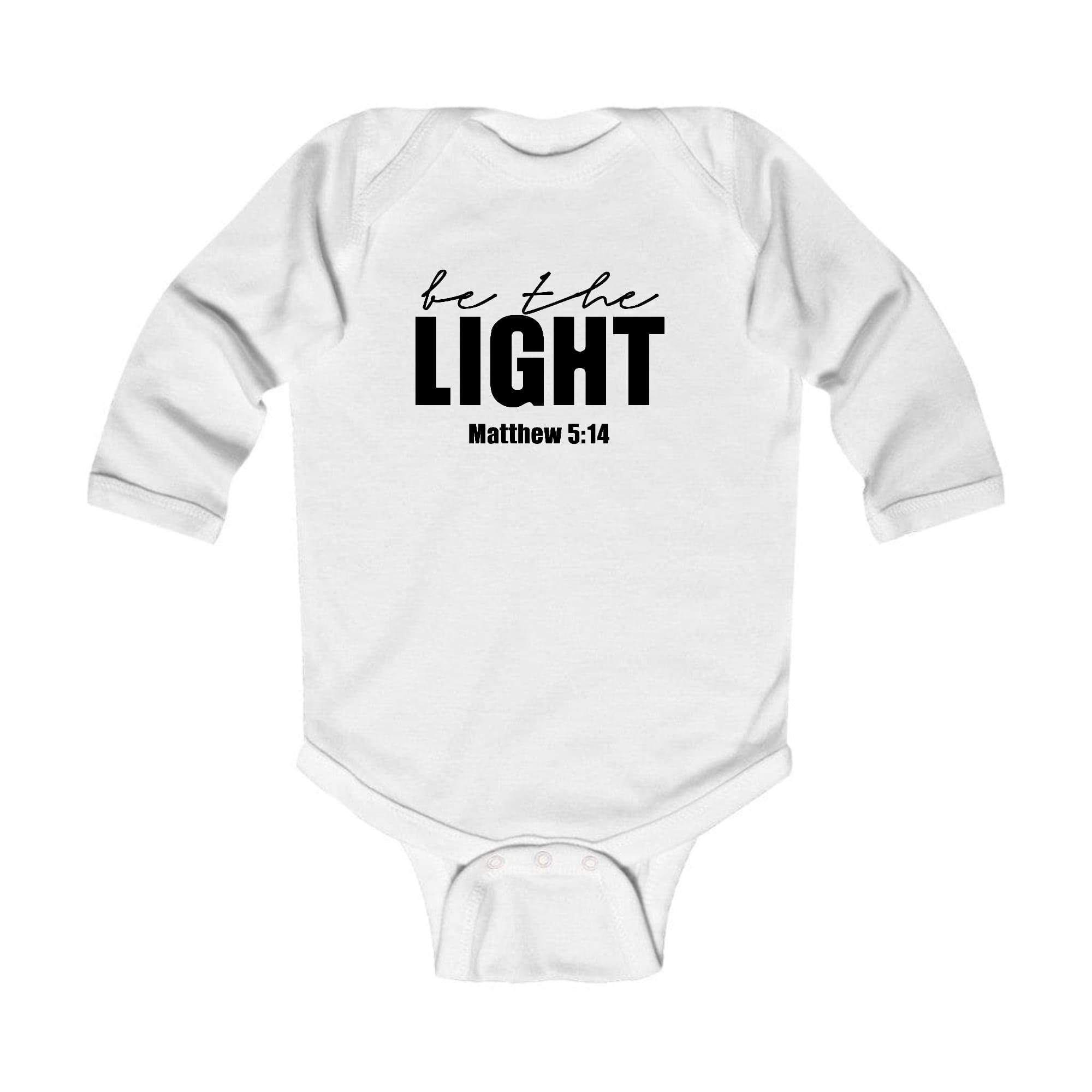 Infant Long Sleeve Graphic T-shirt in black featuring 'Be the Light' inspirational art illustration, designed for comfort and durability.
