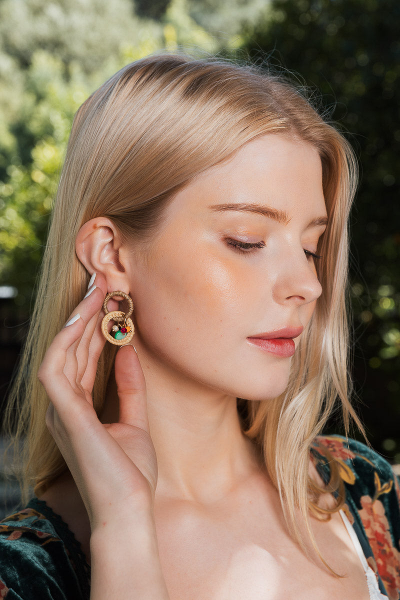 Handcrafted Infinity Bloom Beaded Woven Dangle Earrings featuring intricate beadwork and eco-friendly materials.