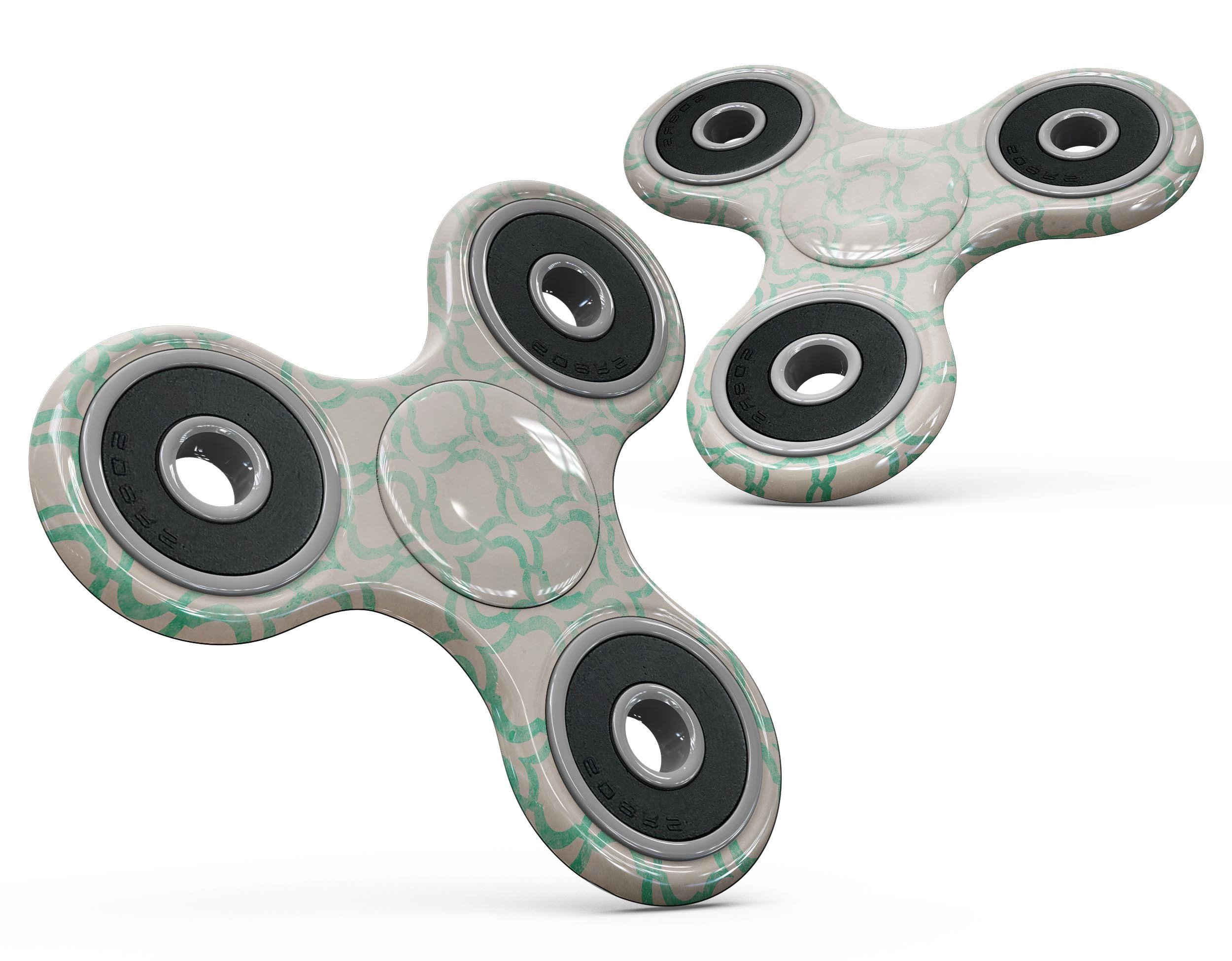 Inverted Teal Oval Pattern Full-Body Fidget Spinner Skin-Kit showcasing vibrant teal design on a fidget spinner.
