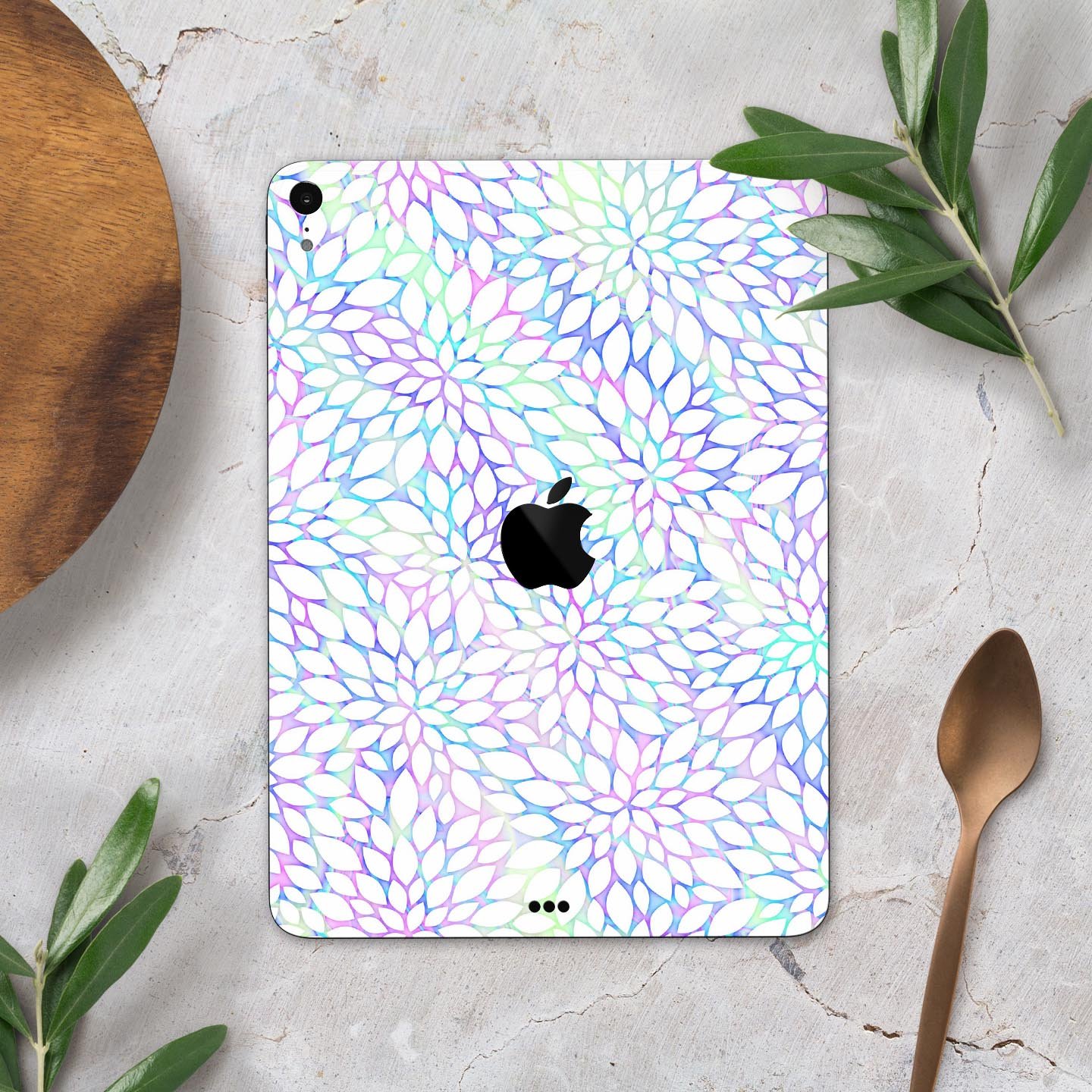 Iridescent Dahlia v2 skin decal applied on an Apple iPad Pro, showcasing vibrant colors and a sleek design.