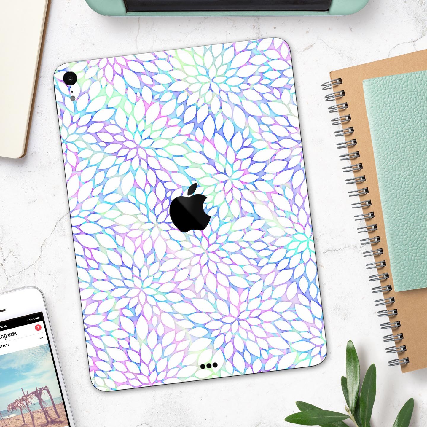 Iridescent Dahlia v2 skin decal applied on an Apple iPad Pro, showcasing vibrant colors and a sleek design.