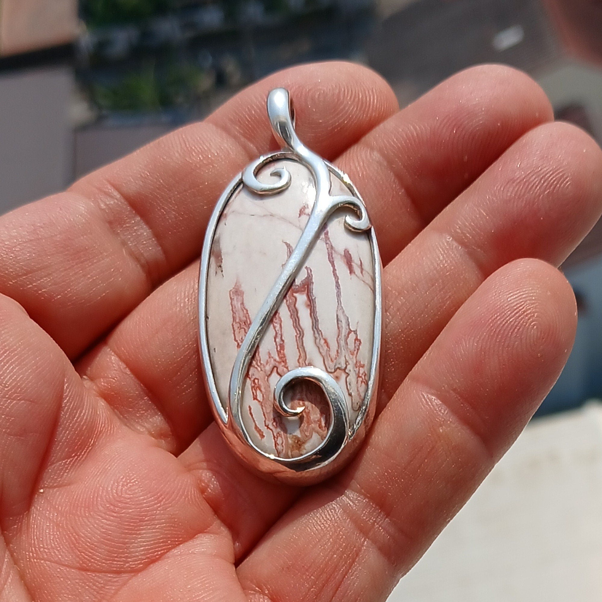 A beautiful Jasper Amulet pendant made of sterling silver, featuring a pear-shaped Jasper gemstone, hallmarked 925, showcasing intricate craftsmanship.