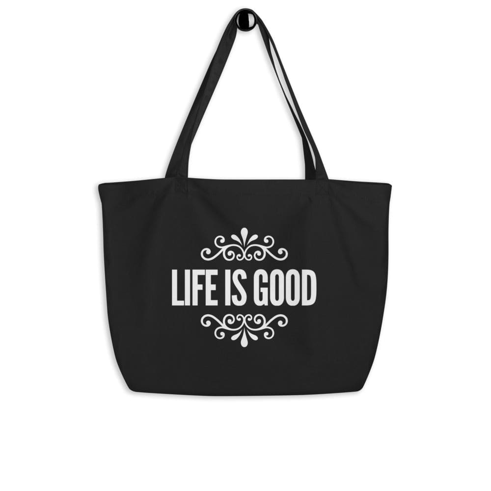 Large black tote bag made of durable cotton with inspirational print, featuring dual straps and spacious interior.