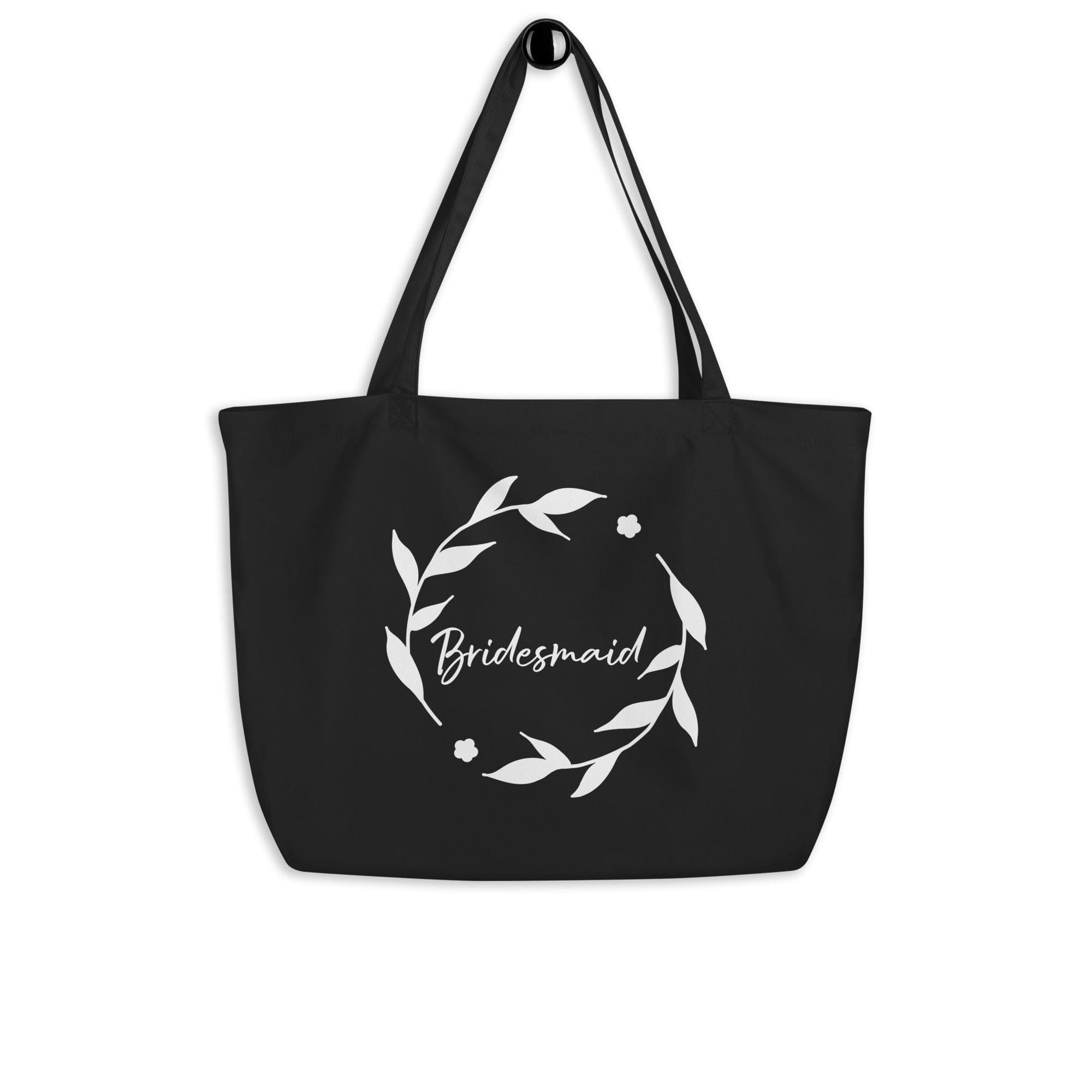 Large black canvas tote bag with dual handles, perfect for bridesmaid gifts and everyday use.