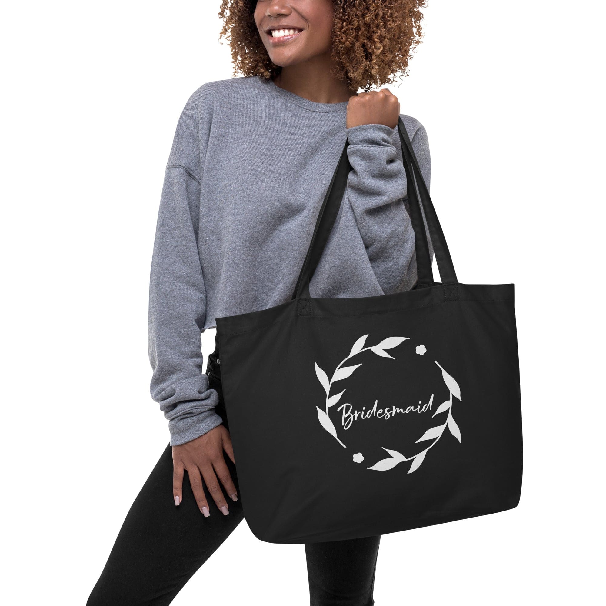 Large black canvas tote bag with dual handles, perfect for bridesmaid gifts and everyday use.