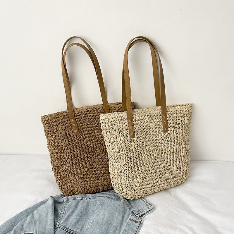 Large Capacity Women's Beach Bag in khaki and beige, featuring a stylish woven design and spacious bucket shape.
