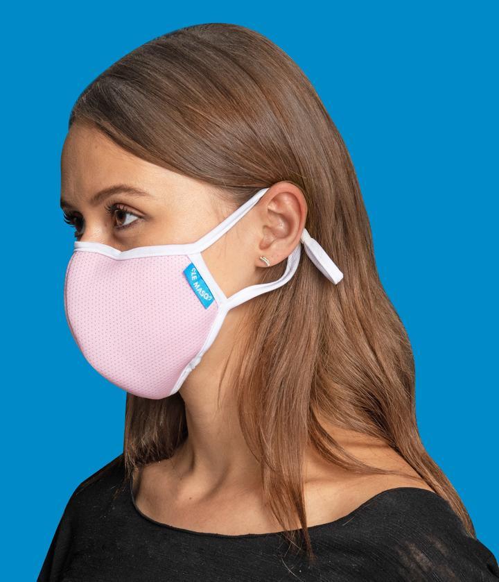 Le Masq 4-Pack featuring lightweight, breathable canvas face masks with adjustable ear toggles and a removable inner layer for added comfort.