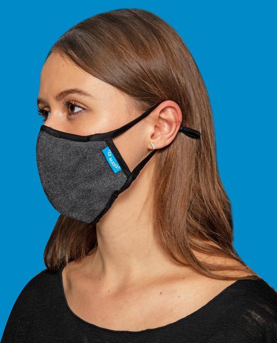 Le Masq 4-Pack featuring lightweight, breathable canvas face masks with adjustable ear toggles and a removable inner layer for added comfort.