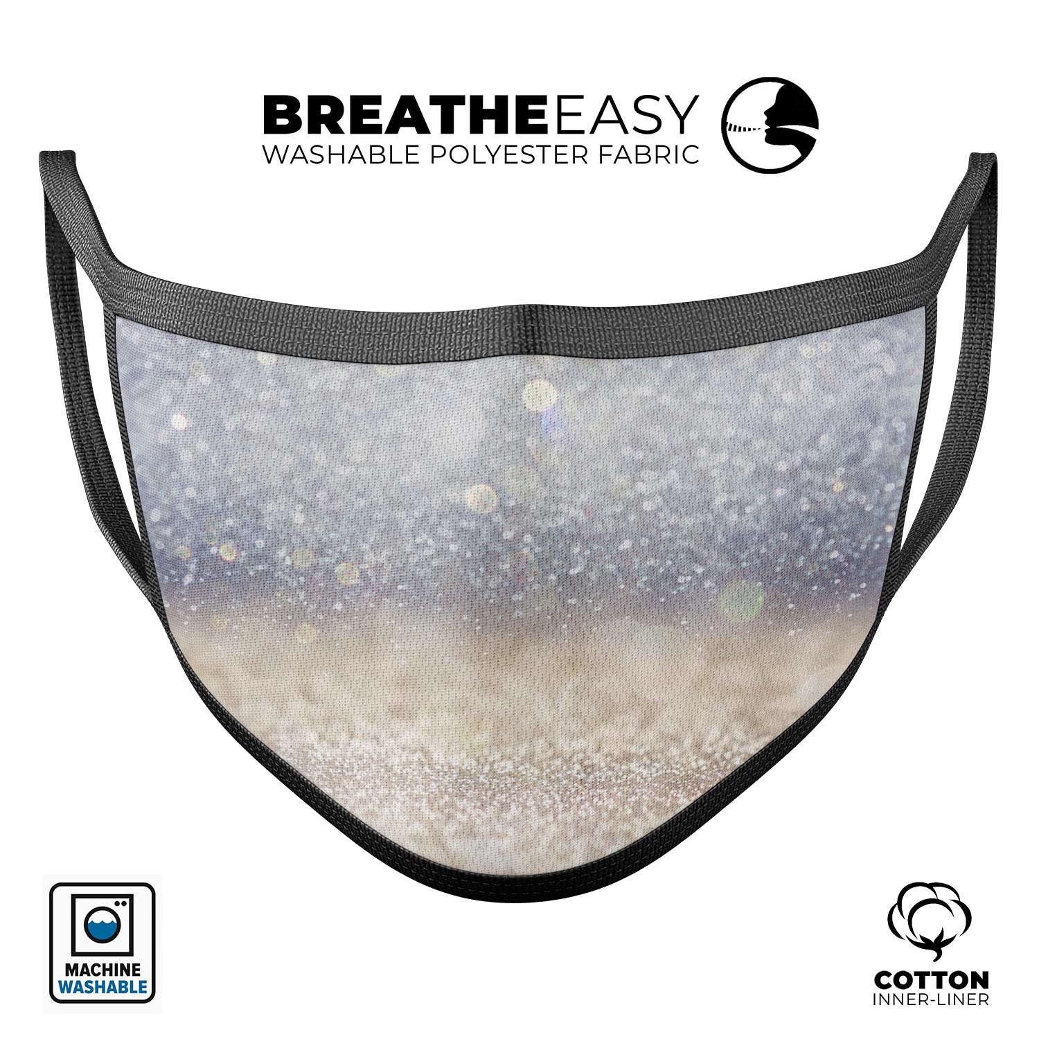 Light Blue and Tan Unfocused Orbs of Light reusable mouth cover, showcasing vibrant colors and adjustable ear-loop bands.