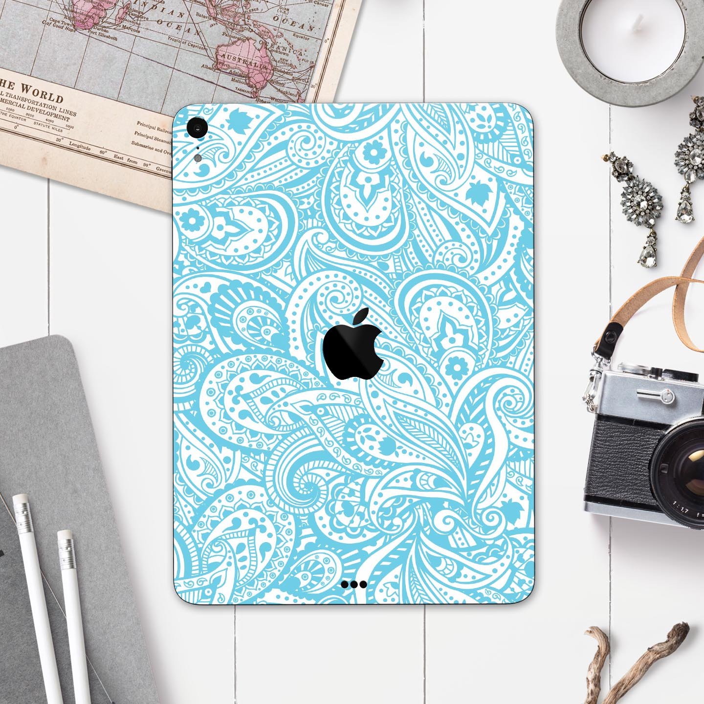 Light Blue Paisley Floral Full Body Skin Decal for Apple iPad, showcasing intricate floral patterns on a sleek surface.