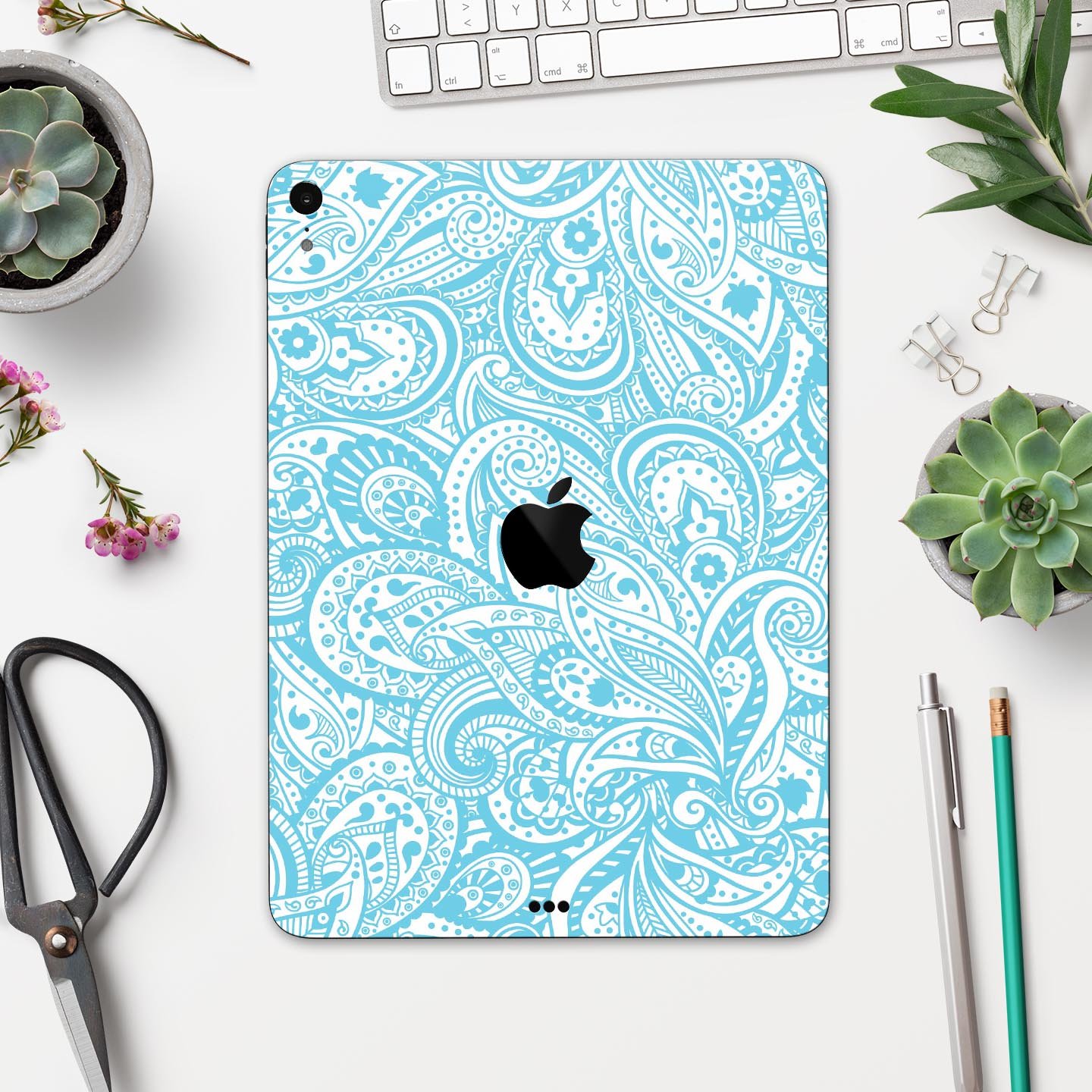 Light Blue Paisley Floral Full Body Skin Decal for Apple iPad, showcasing intricate floral patterns on a sleek surface.