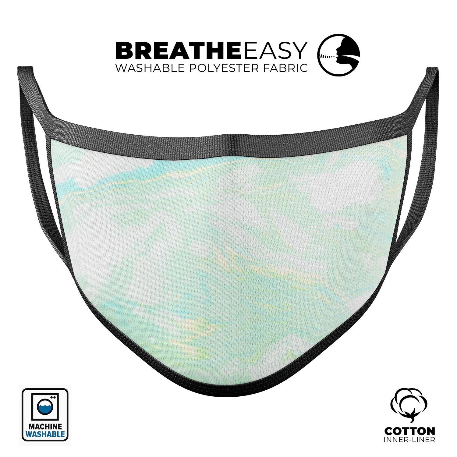 Light Green Textured Marble reusable mouth cover, showcasing adjustable ear loops and soft cotton interior, made in the USA.