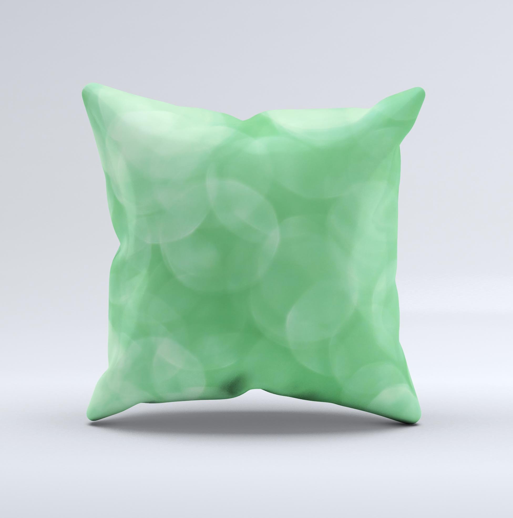Light Green Decorative Throw Pillow with Unfocused Orbs design, handcrafted in Virginia, showcasing unique imperfections.