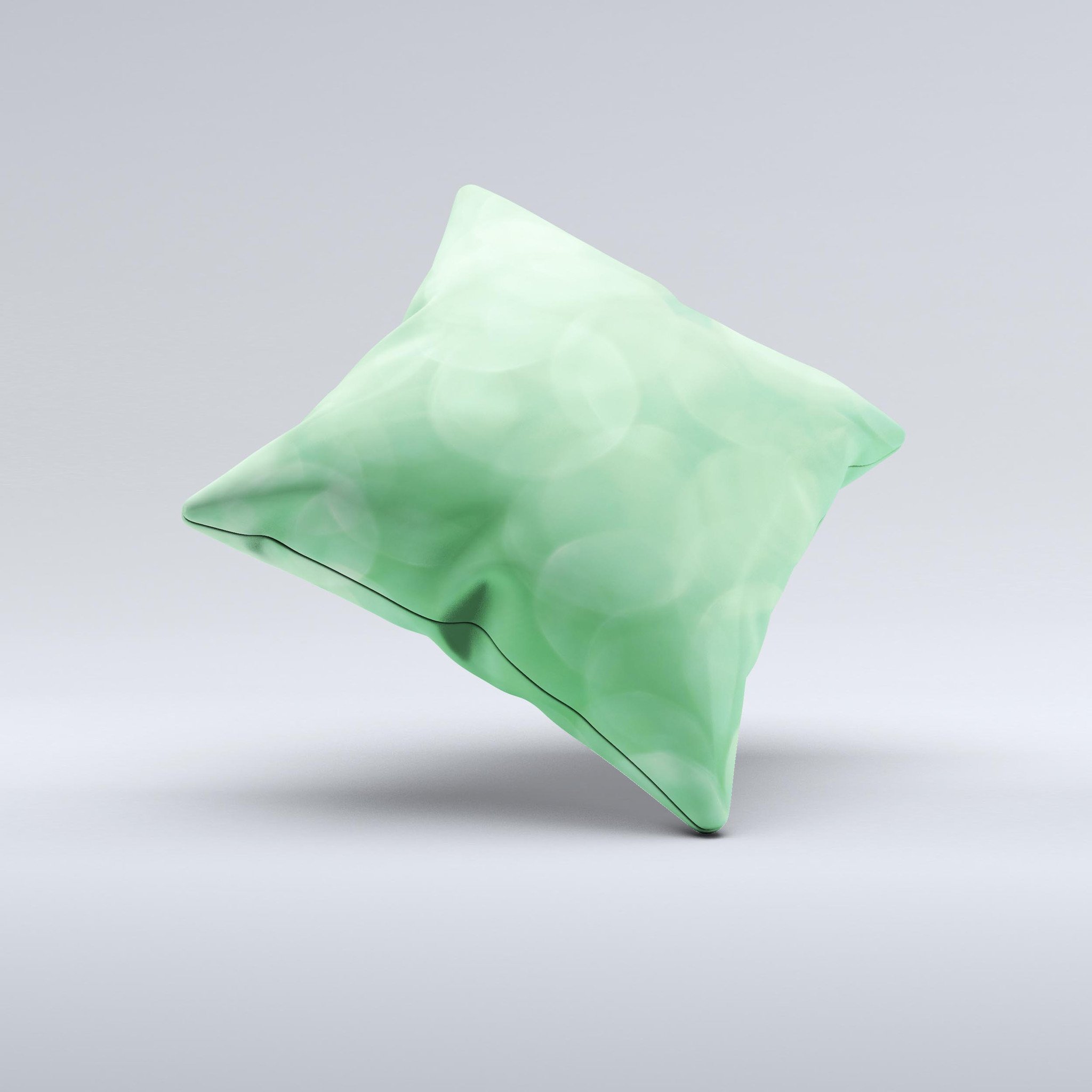 Light Green Decorative Throw Pillow with Unfocused Orbs design, handcrafted in Virginia, showcasing unique imperfections.
