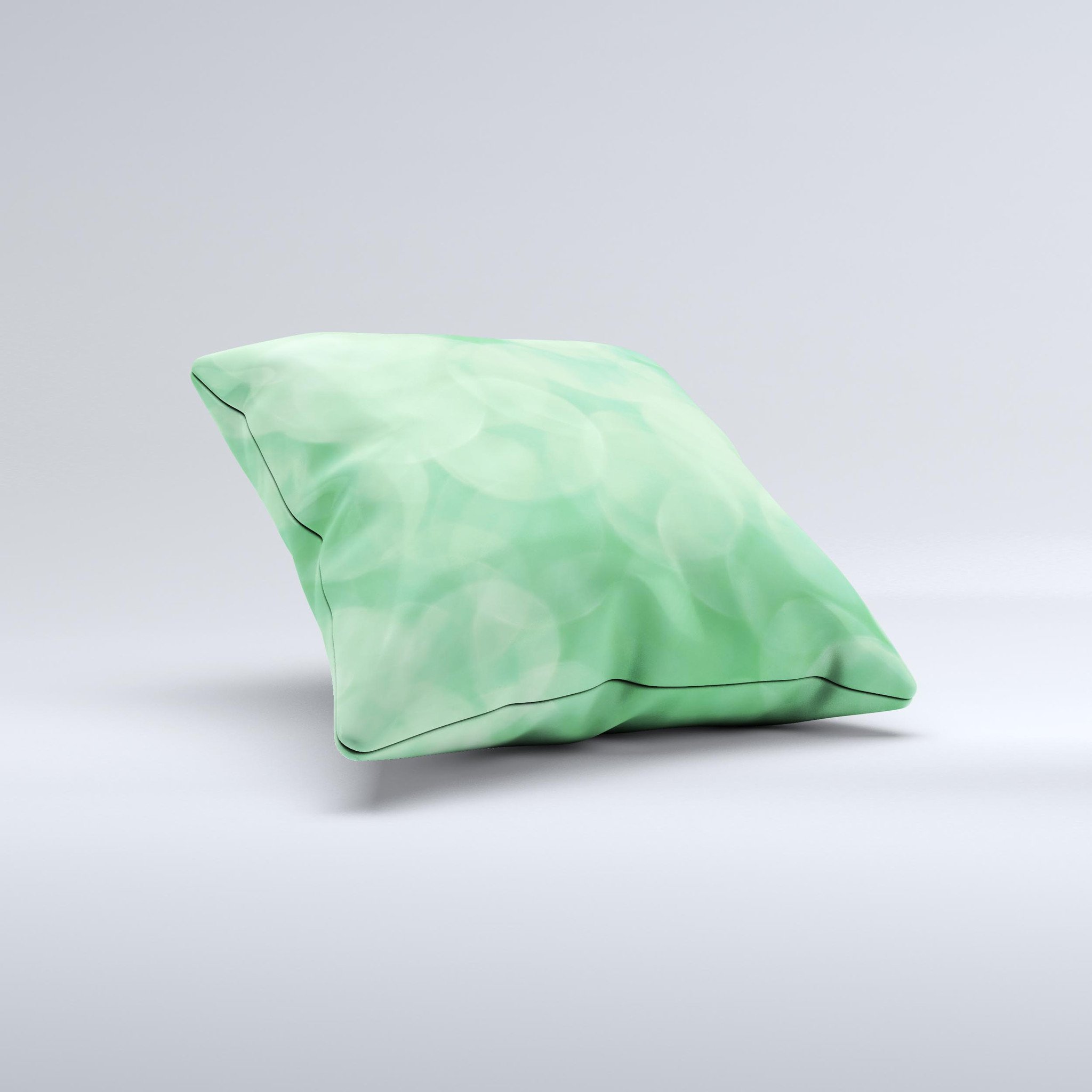Light Green Decorative Throw Pillow with Unfocused Orbs design, handcrafted in Virginia, showcasing unique imperfections.