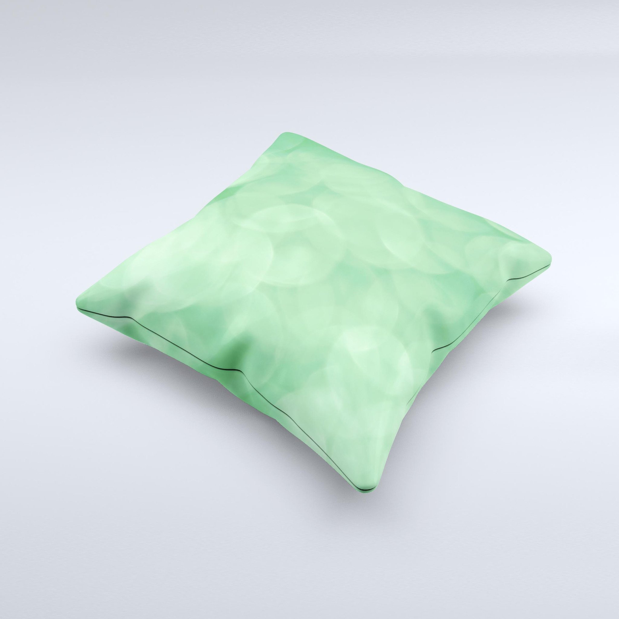 Light Green Decorative Throw Pillow with Unfocused Orbs design, handcrafted in Virginia, showcasing unique imperfections.