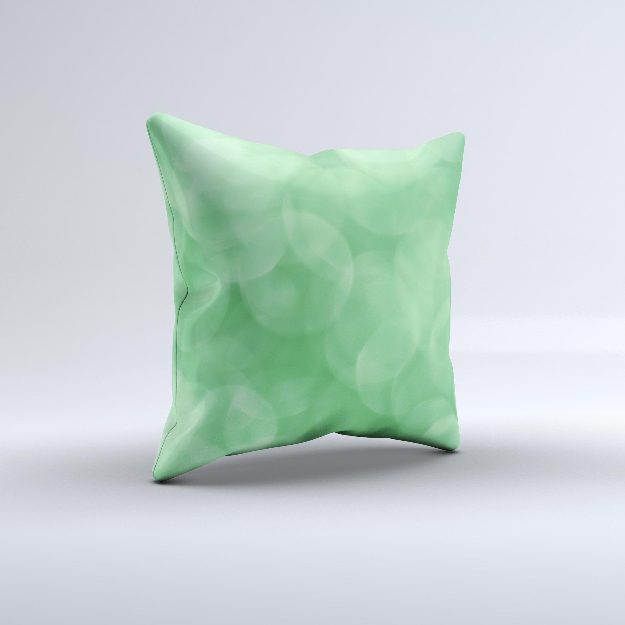 Light Green Decorative Throw Pillow with Unfocused Orbs design, handcrafted in Virginia, showcasing unique imperfections.