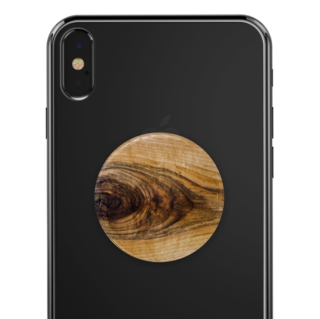 Light Knotted Woodgrain Skin Kit for PopSockets, showcasing a stylish woodgrain design on a smartphone grip.
