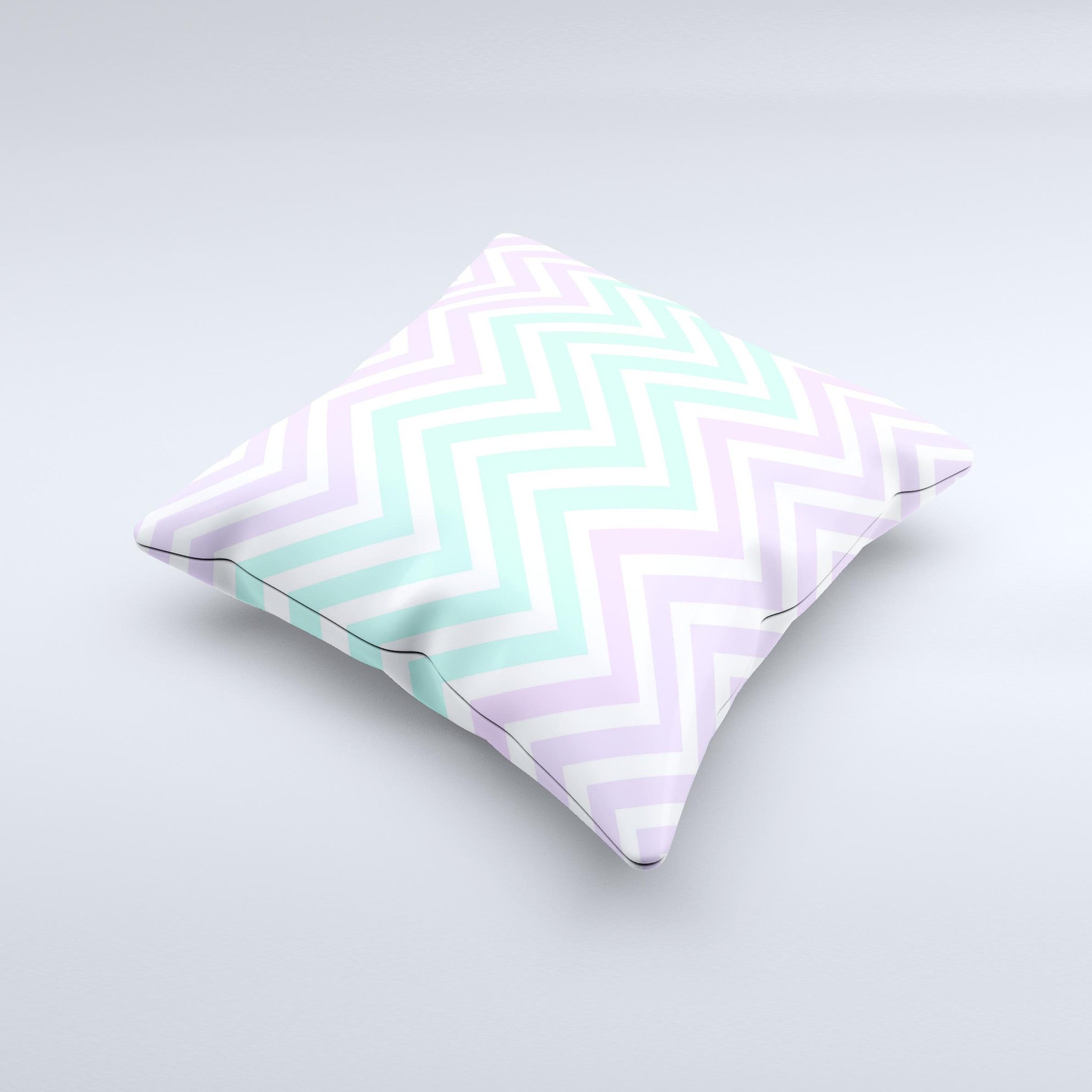 Light teal and purple decorative throw pillow featuring a sharp chevron pattern, handcrafted in Virginia with high-quality materials.