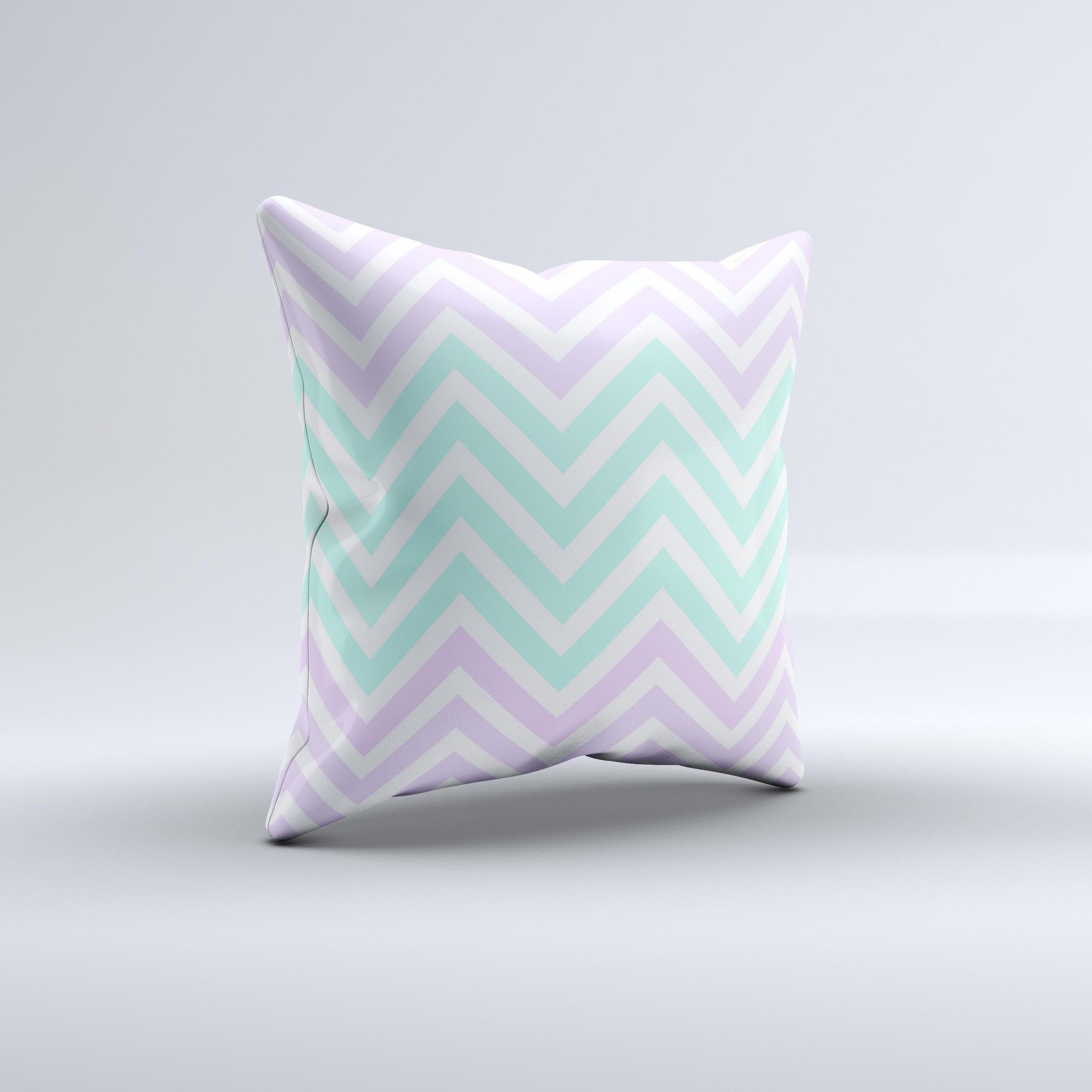 Light teal and purple decorative throw pillow featuring a sharp chevron pattern, handcrafted in Virginia with high-quality materials.