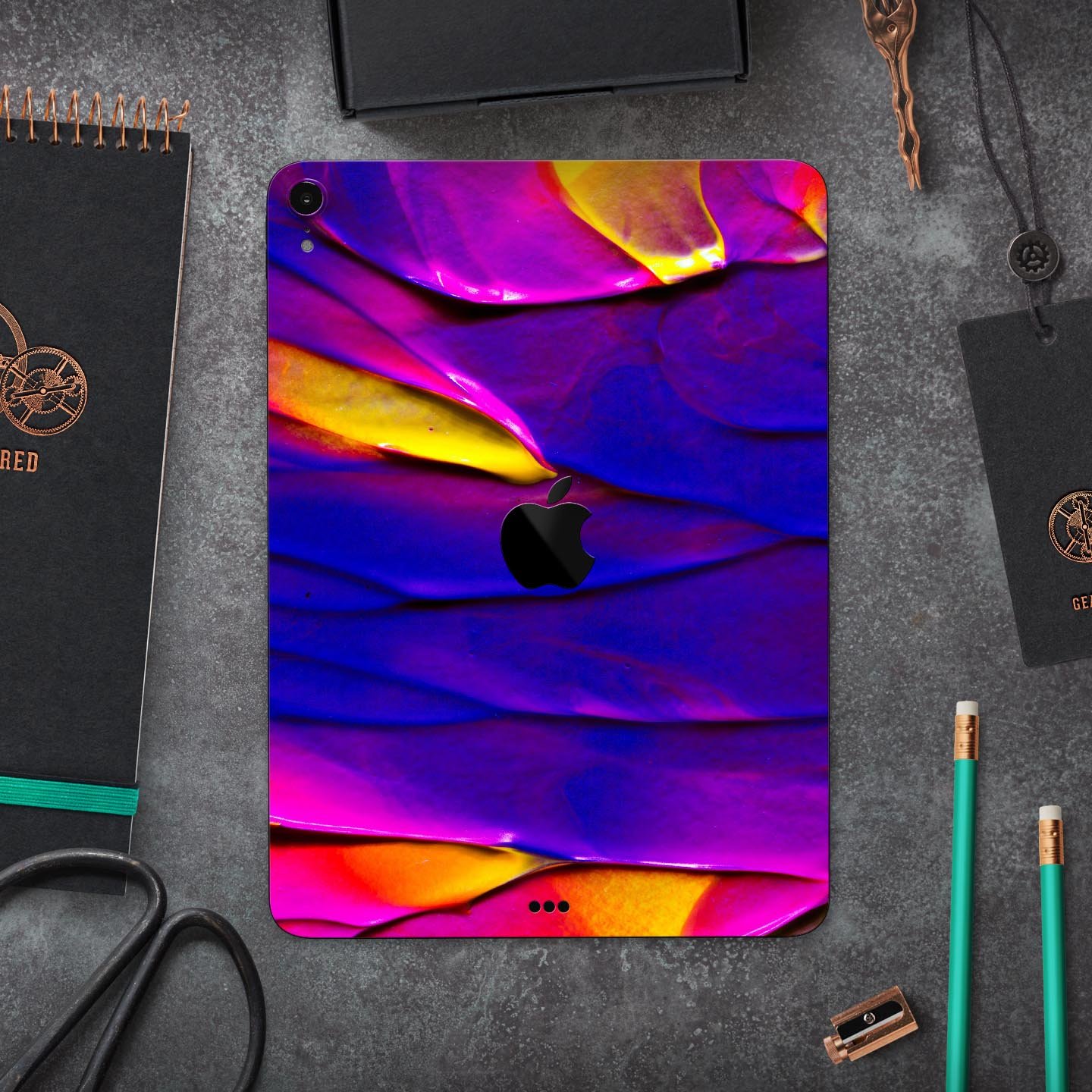 Liquid Abstract Paint V9 skin decal for Apple iPad Pro, showcasing vibrant colors and a sleek design.