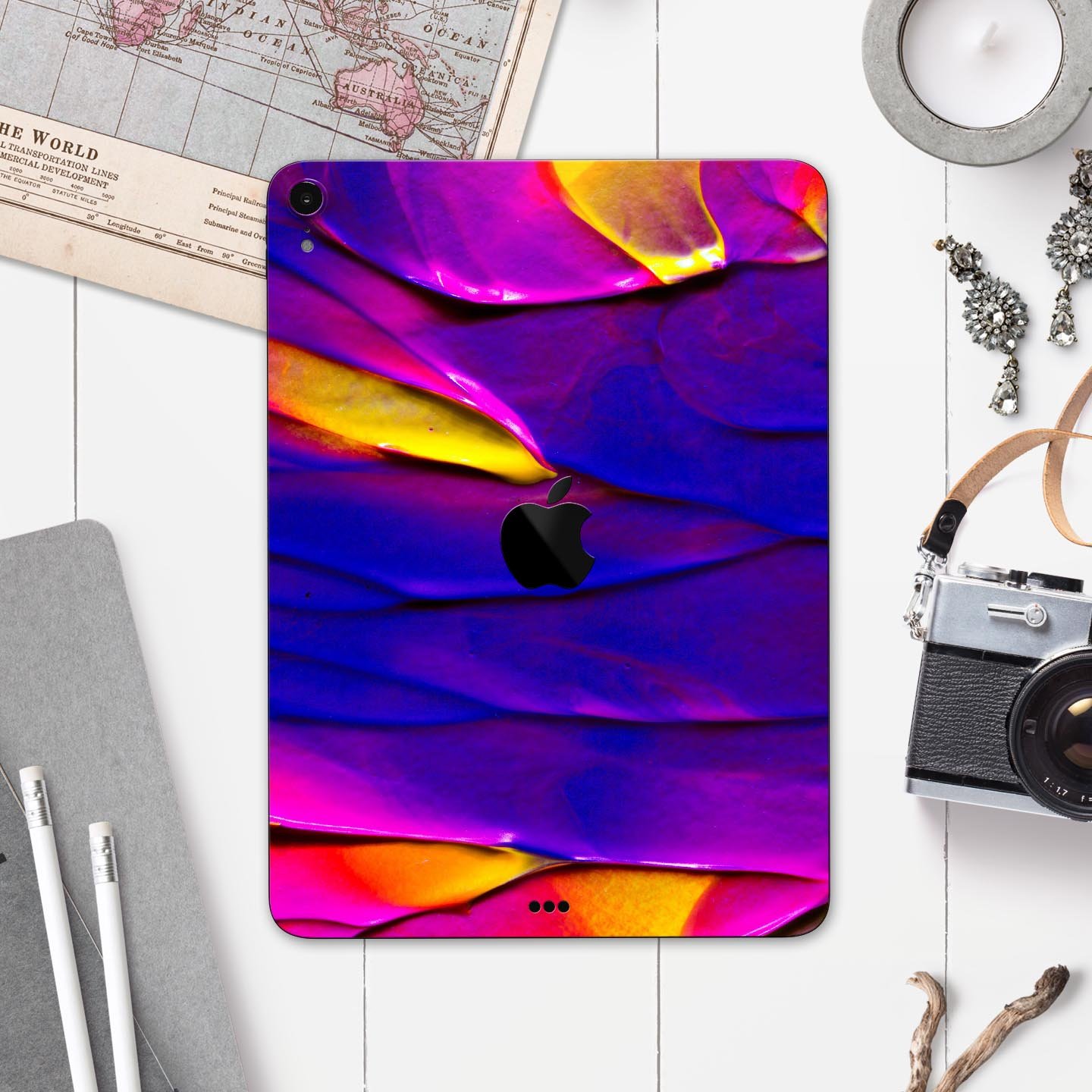 Liquid Abstract Paint V9 skin decal for Apple iPad Pro, showcasing vibrant colors and a sleek design.