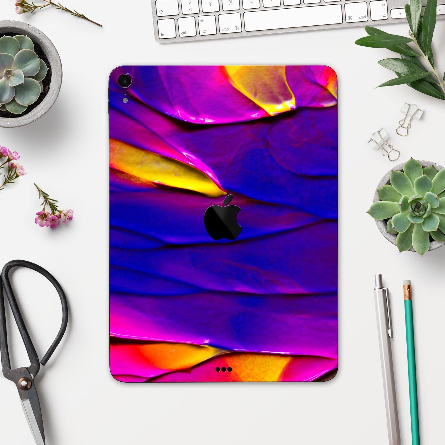 Liquid Abstract Paint V9 skin decal for Apple iPad Pro, showcasing vibrant colors and a sleek design.