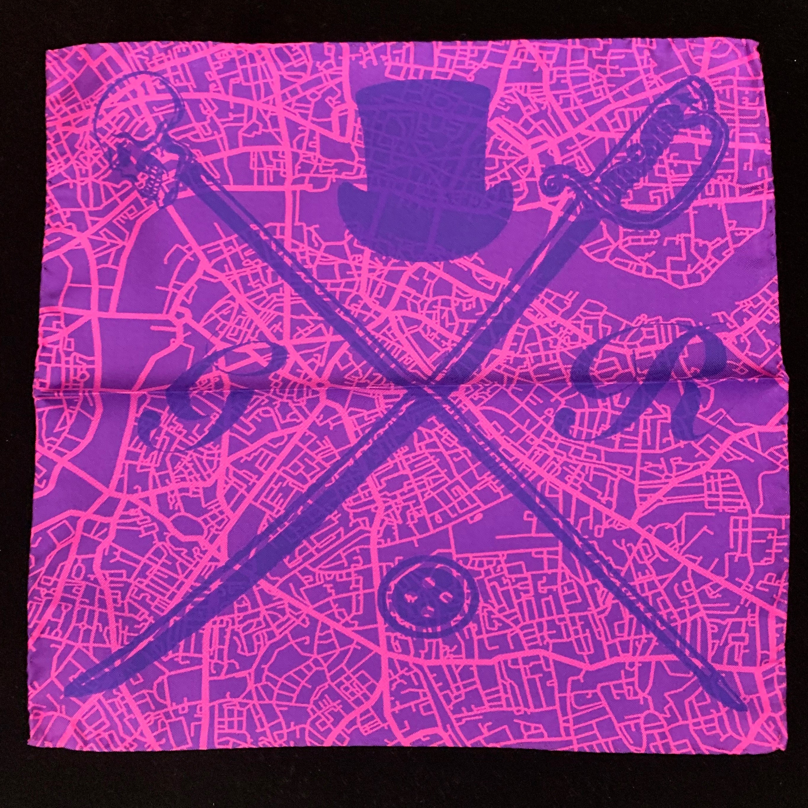 London Street Map Magenta Pocket Square featuring a vibrant design and Gentleman Rogue logo, crafted from 100% silk.