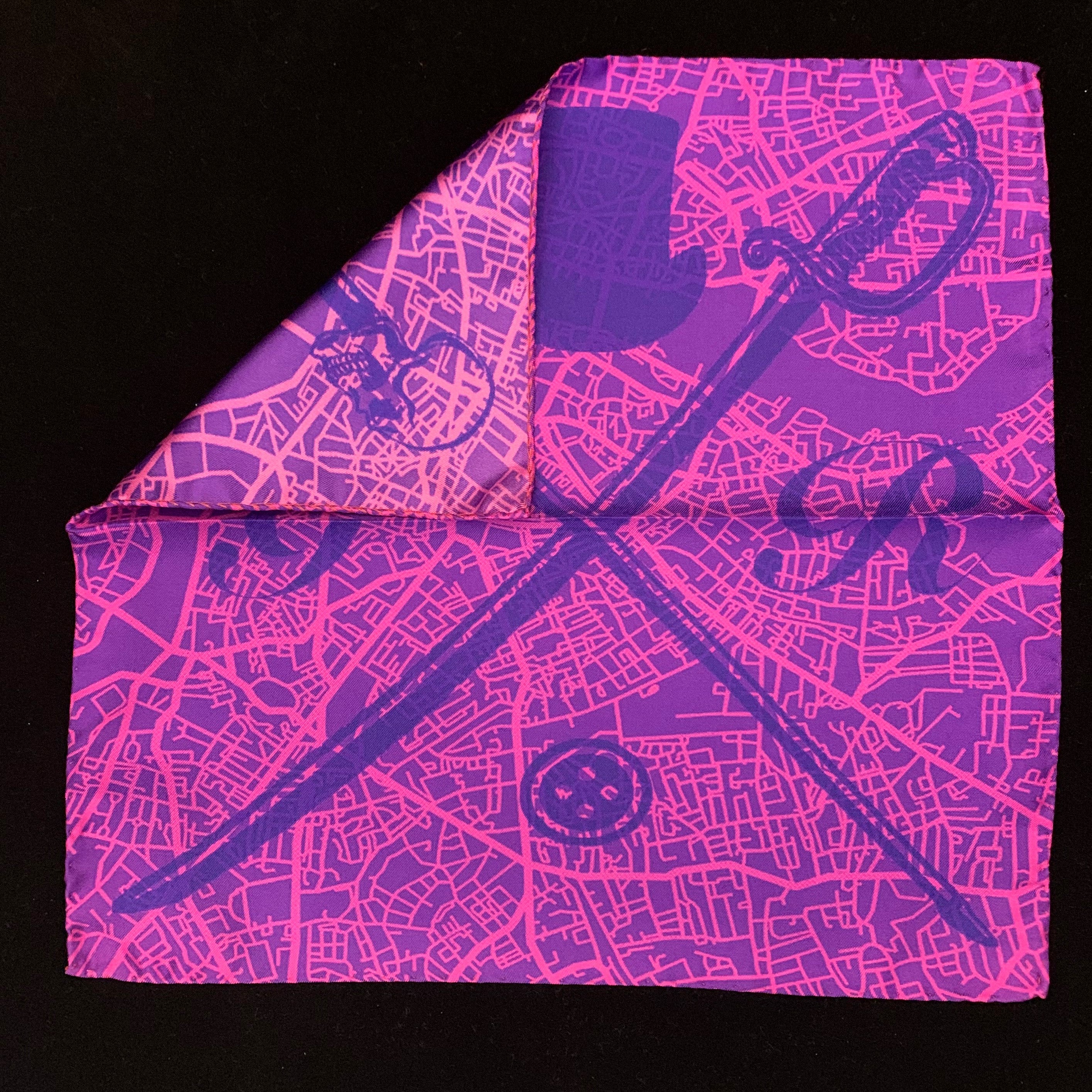 London Street Map Magenta Pocket Square featuring a vibrant design and Gentleman Rogue logo, crafted from 100% silk.
