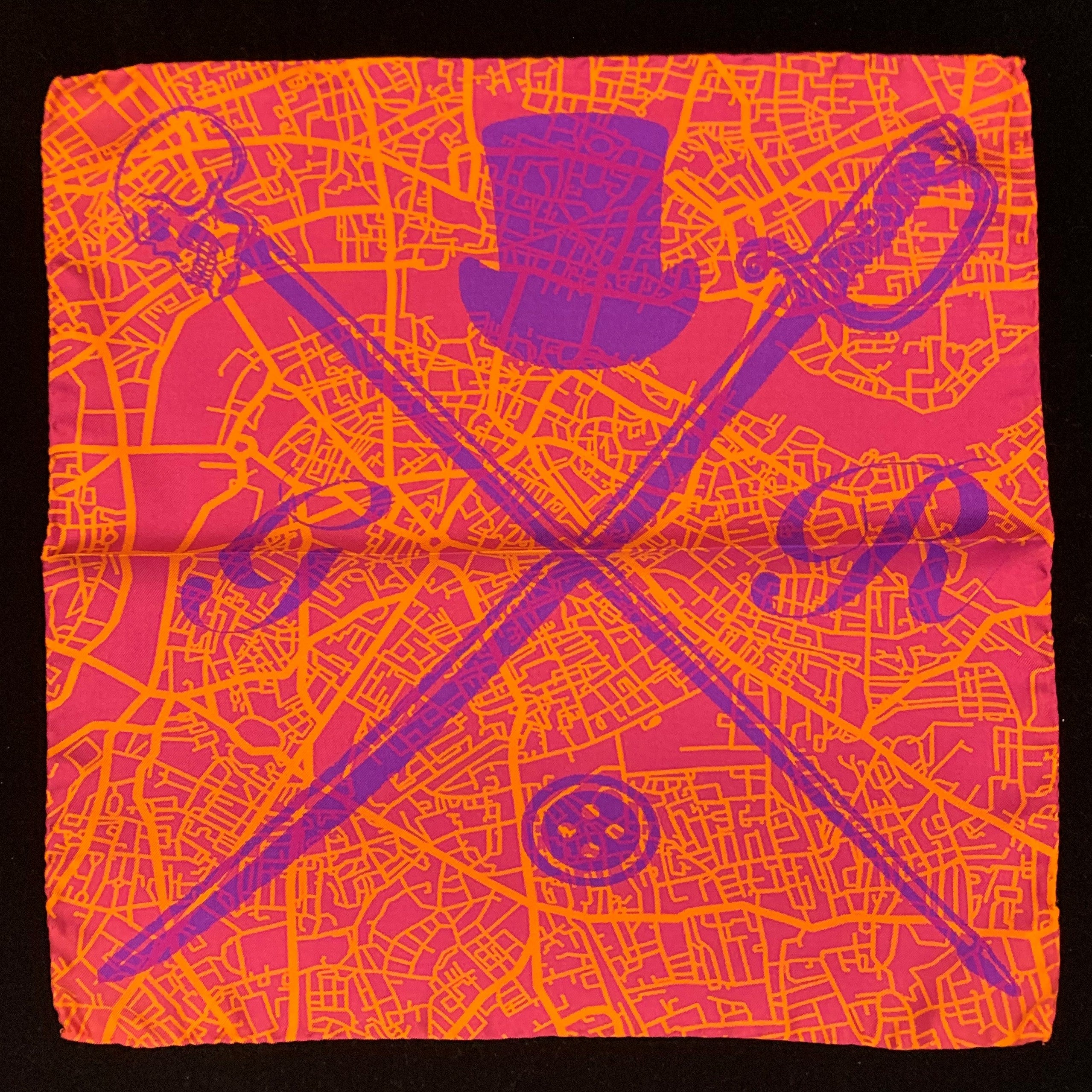 London Street Map Orange Pocket Square featuring a vibrant orange design with a detailed map of London and the Gentleman Rogue logo.