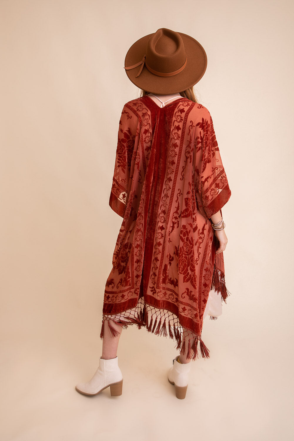 A lightweight kimono featuring a bold velvet tapestry print, perfect for layering and stylish outfits.