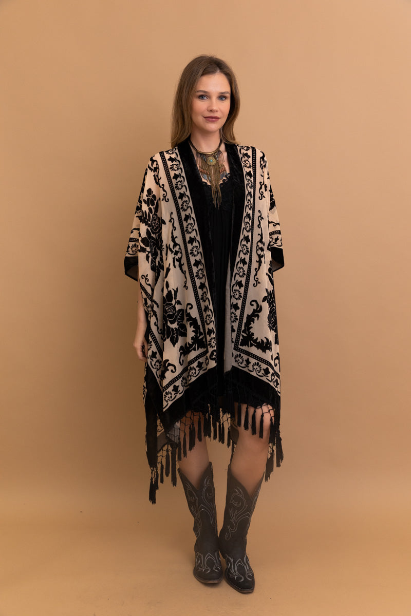 A lightweight kimono featuring a bold velvet tapestry print, perfect for layering and stylish outfits.