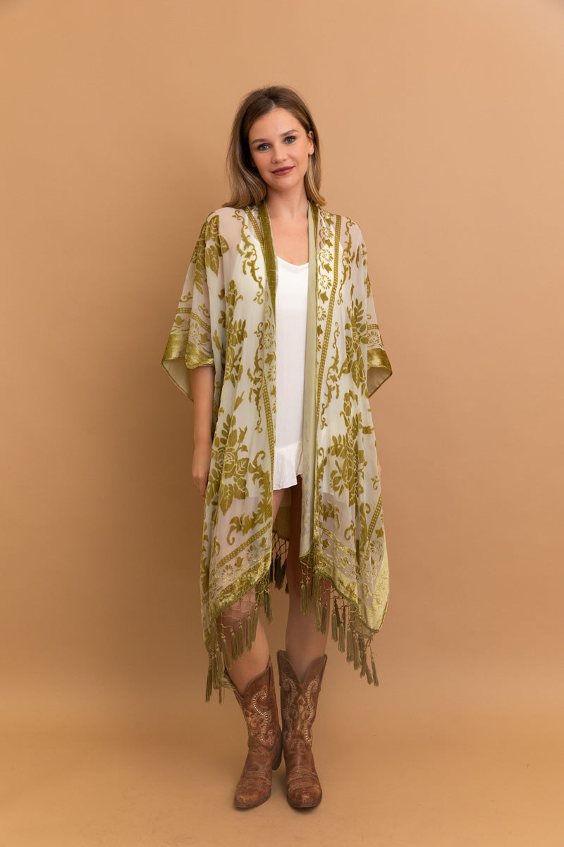 A lightweight kimono featuring a bold velvet tapestry print, perfect for layering and stylish outfits.