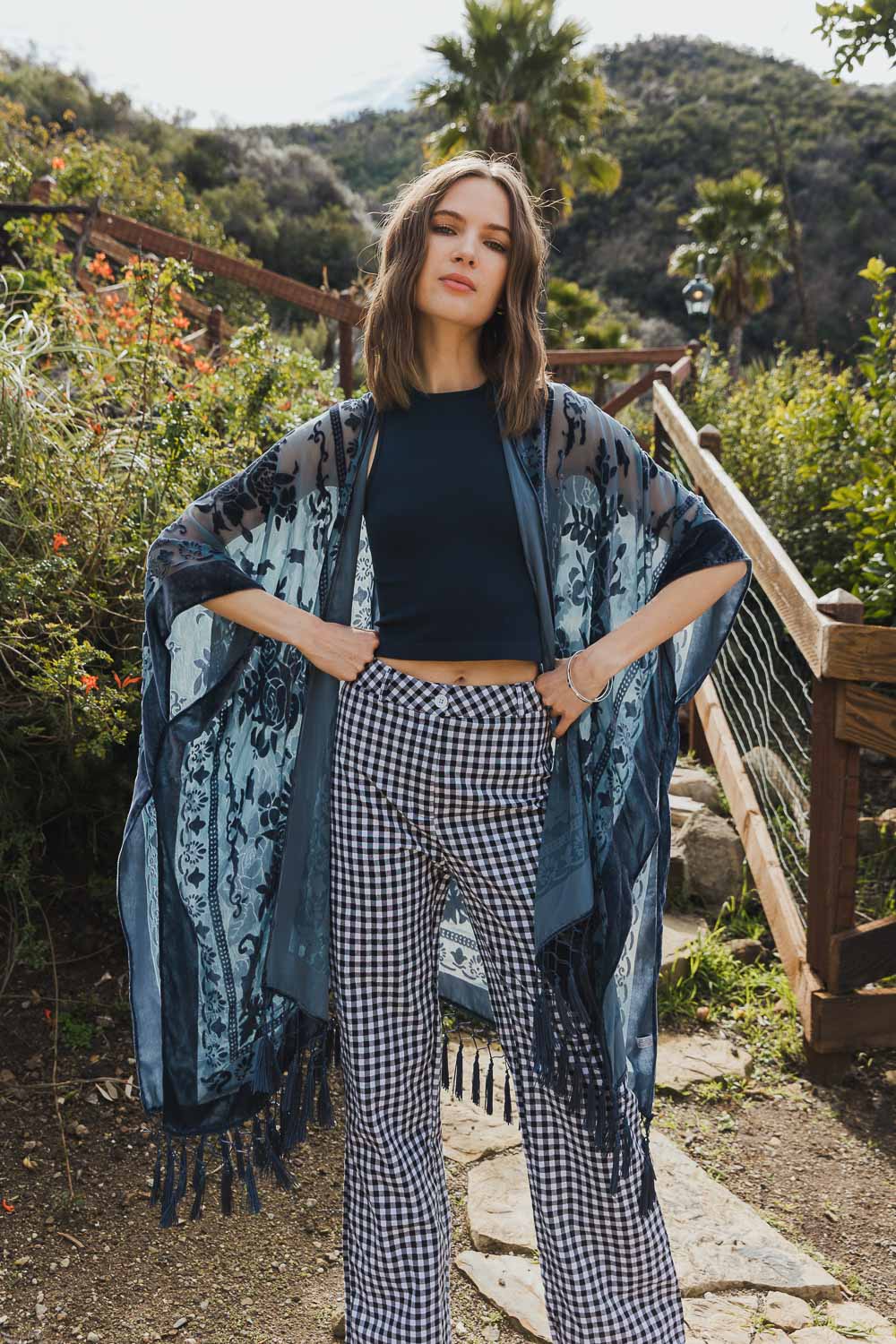 A lightweight kimono featuring a bold velvet tapestry print, perfect for layering and stylish outfits.