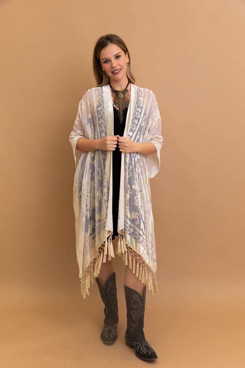 A lightweight kimono featuring a bold velvet tapestry print, perfect for layering and stylish outfits.