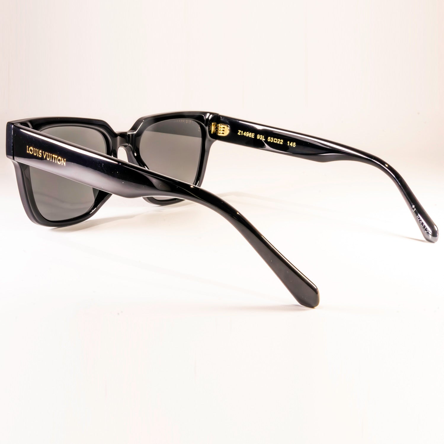 Stylish LV Escape Square Z1496E Sunglasses featuring bold black acetate frame and signature Damier pattern.